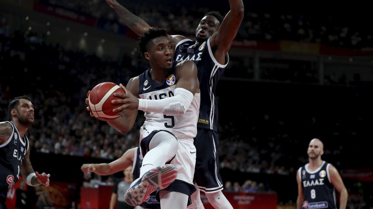 US loses to Serbia 94-89, assuring worst big-tourney finish