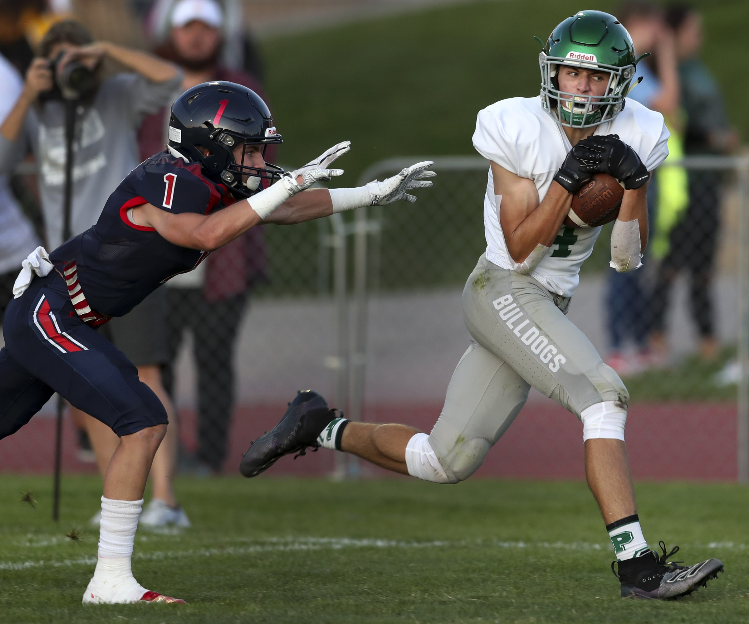 Provo wide receiver Taylor Heiner catches a long pass for a touchdown in front of Springville corner back Cole McAllister during football game at Springville High School on Friday, Sept. 13, 2019. (Photo: Steve Griffin, KSL)