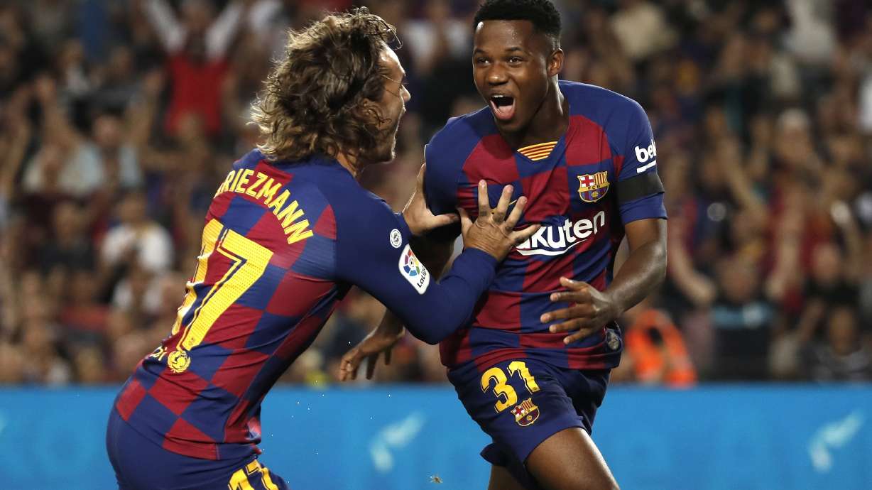 Barca teen Ansu Fati leads rout of Valencia, sets new record