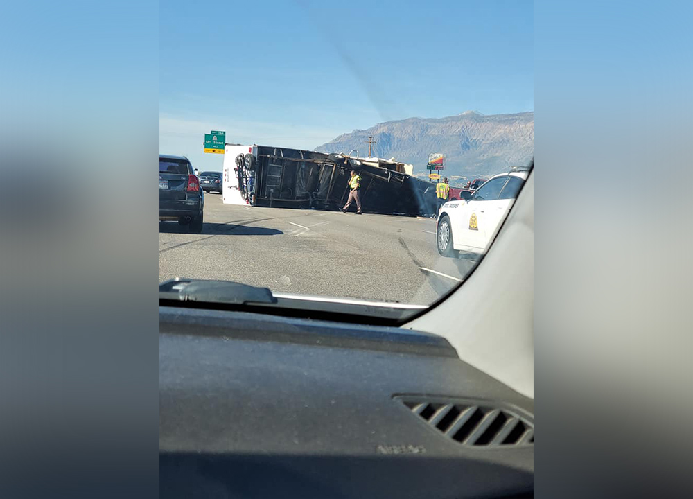 Camping trailer rollover temporarily closes 3 lanes on northbound I-15 in Weber County