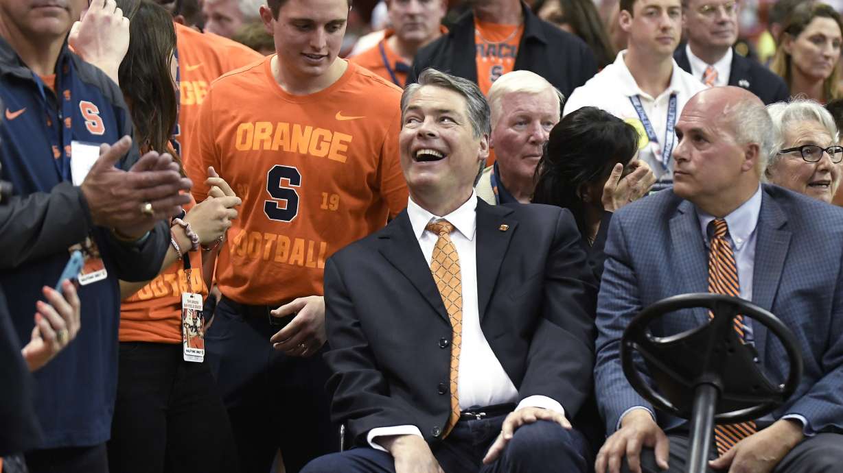 Former Syracuse star Tim Green has his No. 72 retired
