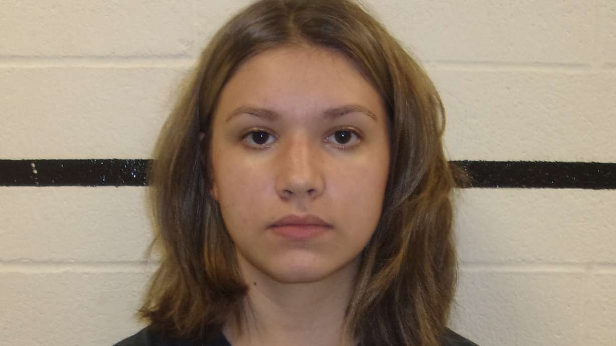Oklahoma woman accused of threatening to shoot up old school