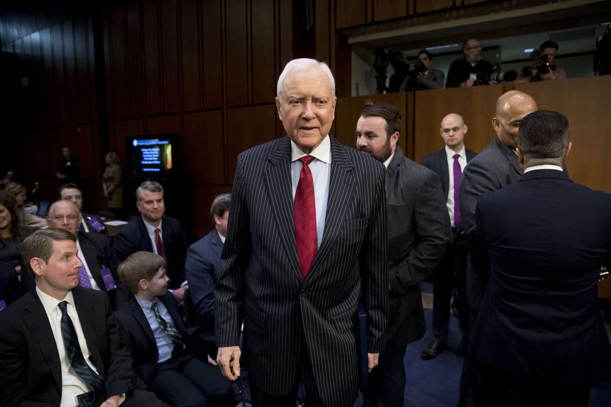 Former Sen. Orrin Hatch, R-Utah., arrives before a Senate Judiciary Committee hearing on Capitol Hill in Washington, Tuesday, Jan. 15, 2019, for Attorney General nominee William Barr. As he did almost 30 years ago, Barr is appearing before the Senate Judiciary Committee to make the case he's qualified to serve as attorney general. (AP Photo/Andrew Harnik)