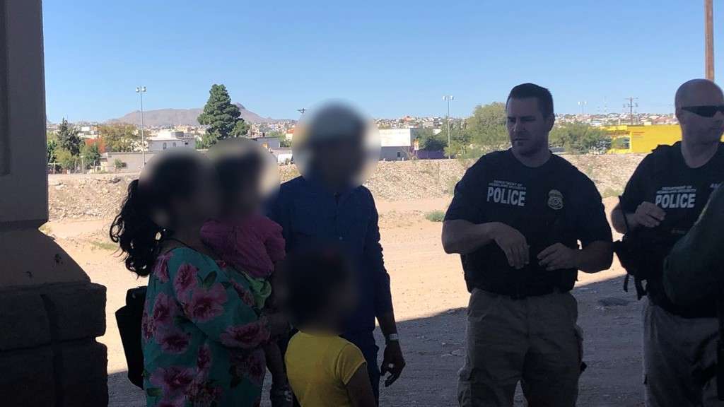 During a tour of the Paso Del Norte Port of Entry and Border Patrol Satellite Processing Center in El Paso County, Texas, on Tuesday, Sept. 17, 2019, Salt Lake County Mayor Jenny Wilson took this picture of a family being apprehended by agents. Wilson, who took the tour with members of the National Association of Counties, said she chose to blur the family's faces from the photo for privacy purposes. Photo: Salt Lake County Mayor Jenny Wilson