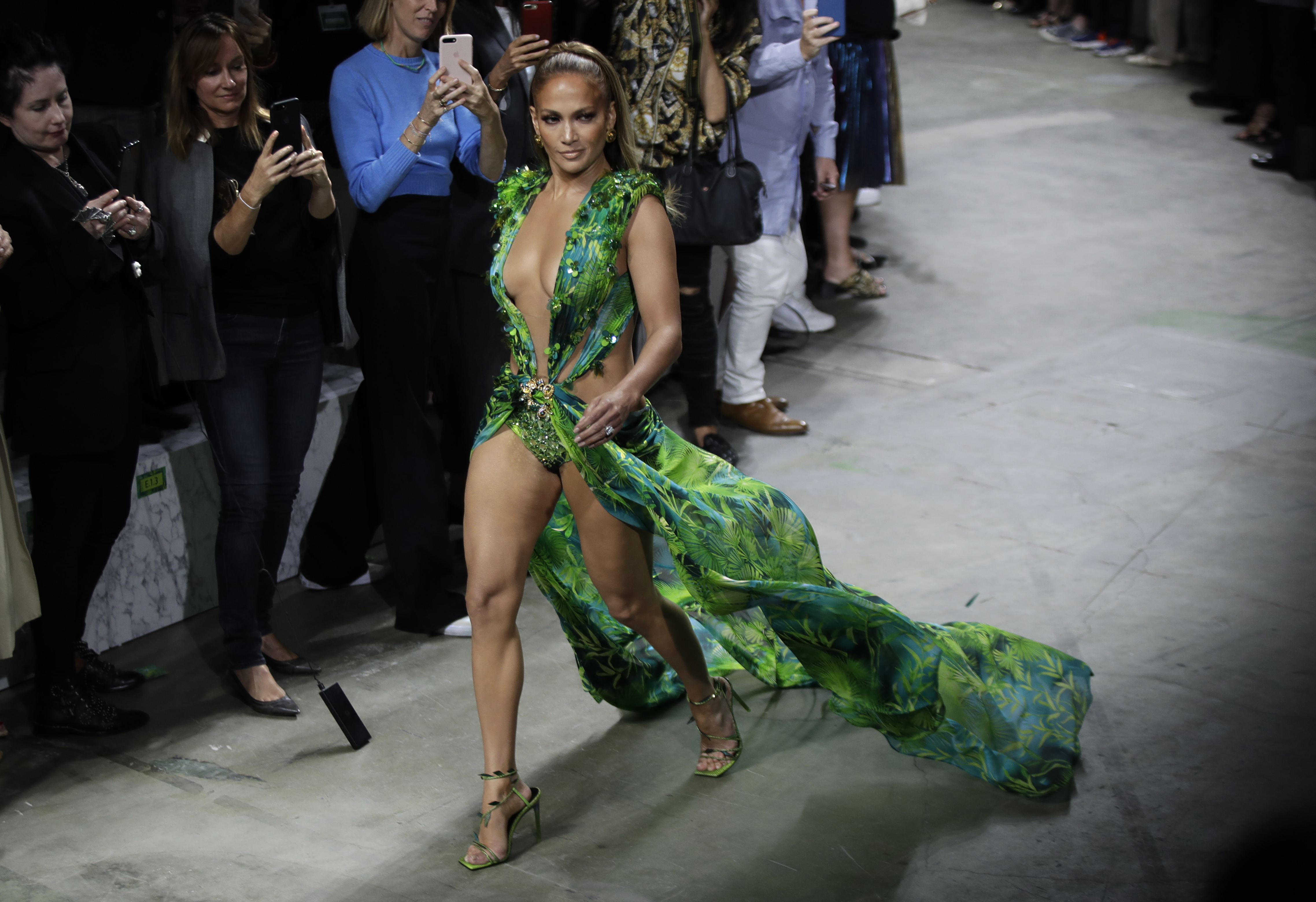 Milan Fashion: J-Lo struts updated jungle dress at Versace