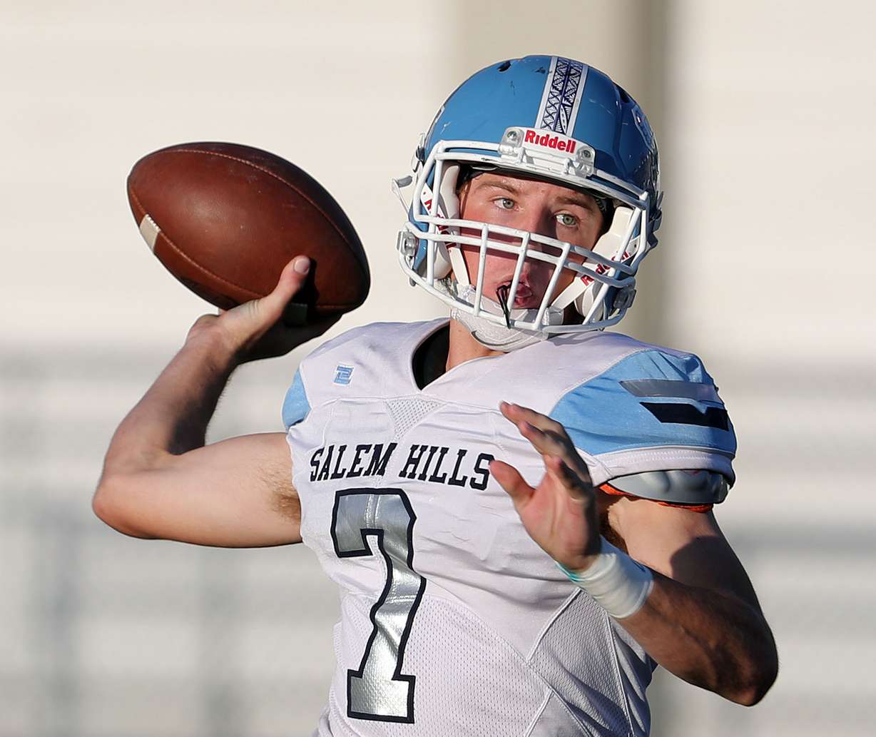 Jarret Elmer steps back to pass for Salem Hills faces Highland in a high school football game played in Salt Lake City on Friday, Sept. 13, 2019. (Photo: Ravell Call, KSL)