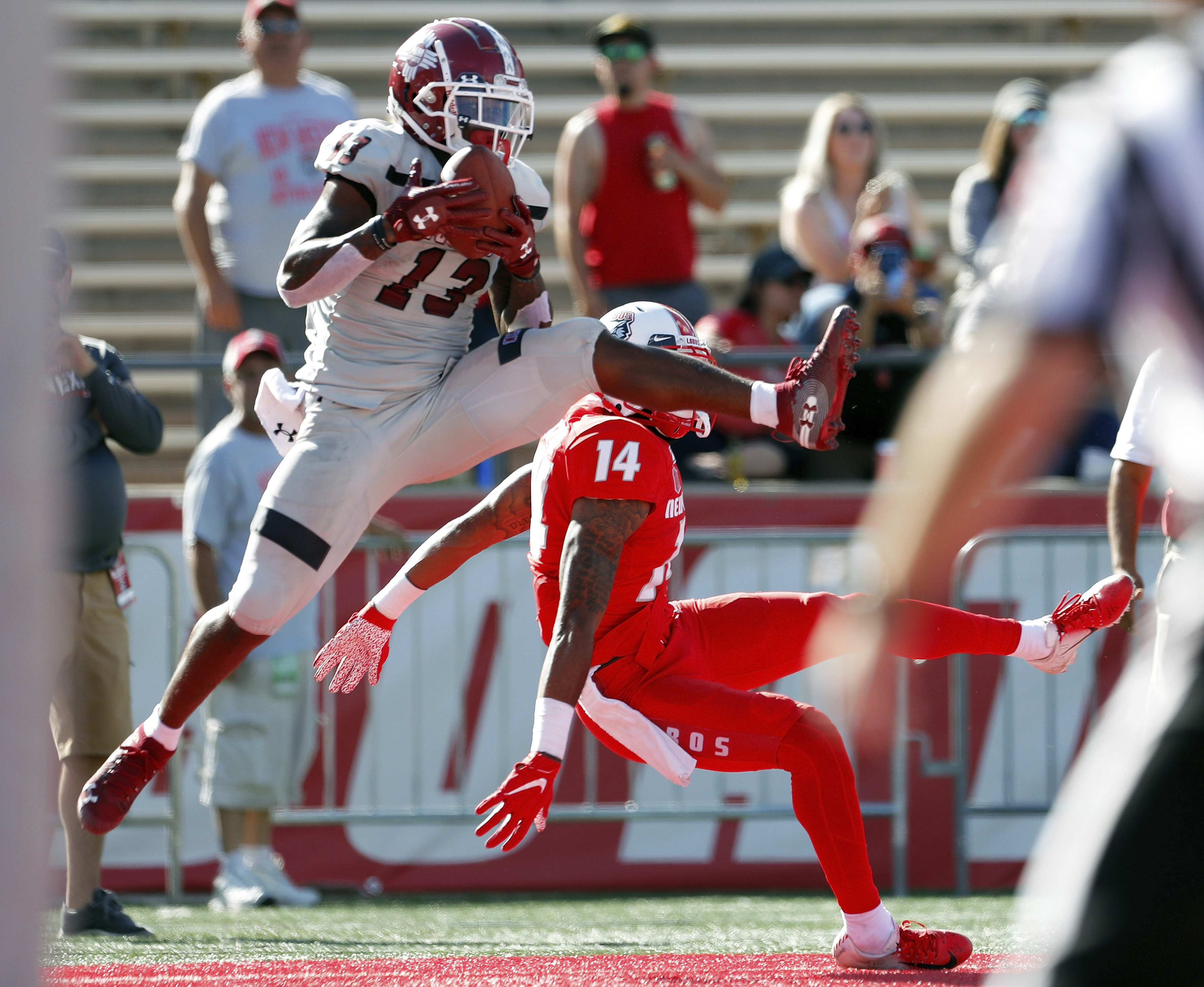 Tuioti leads New Mexico past New Mexico State 55-52