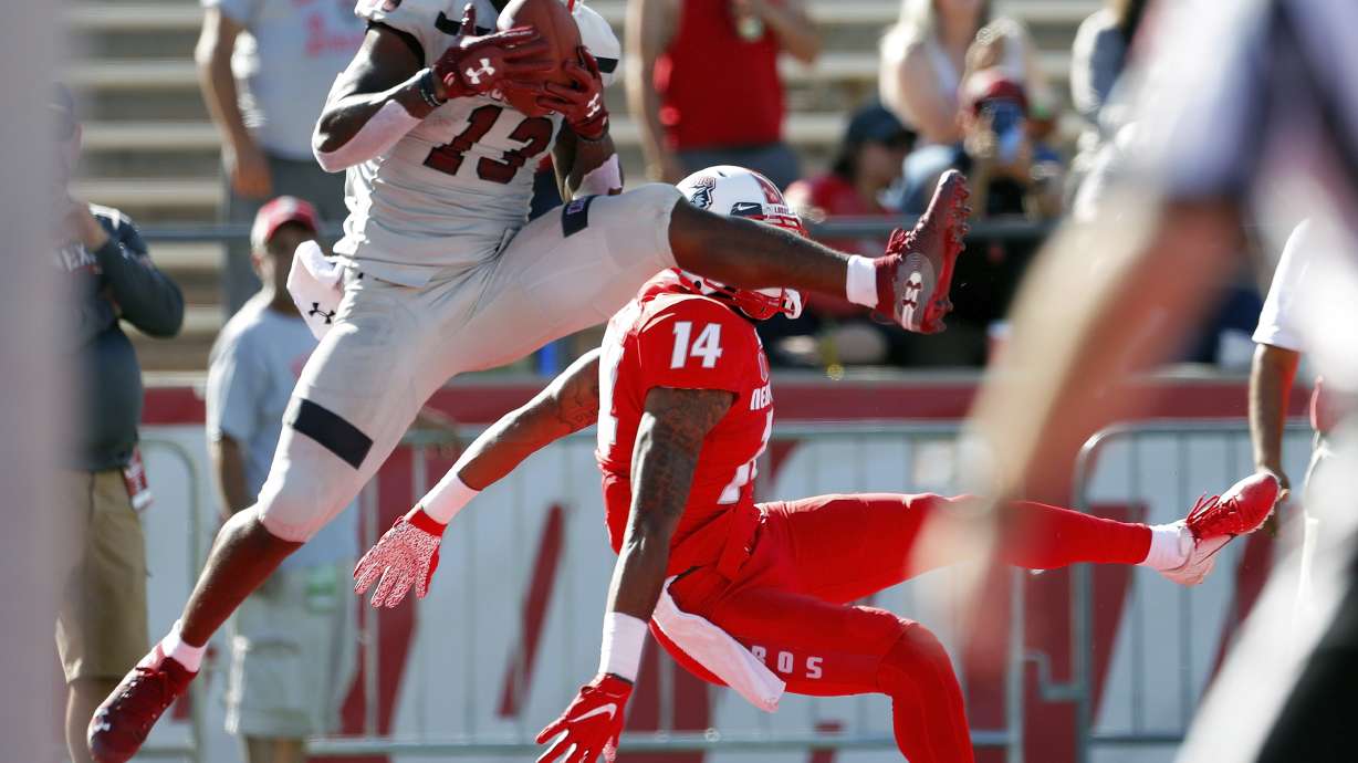 Tuioti leads New Mexico past New Mexico State 55-52