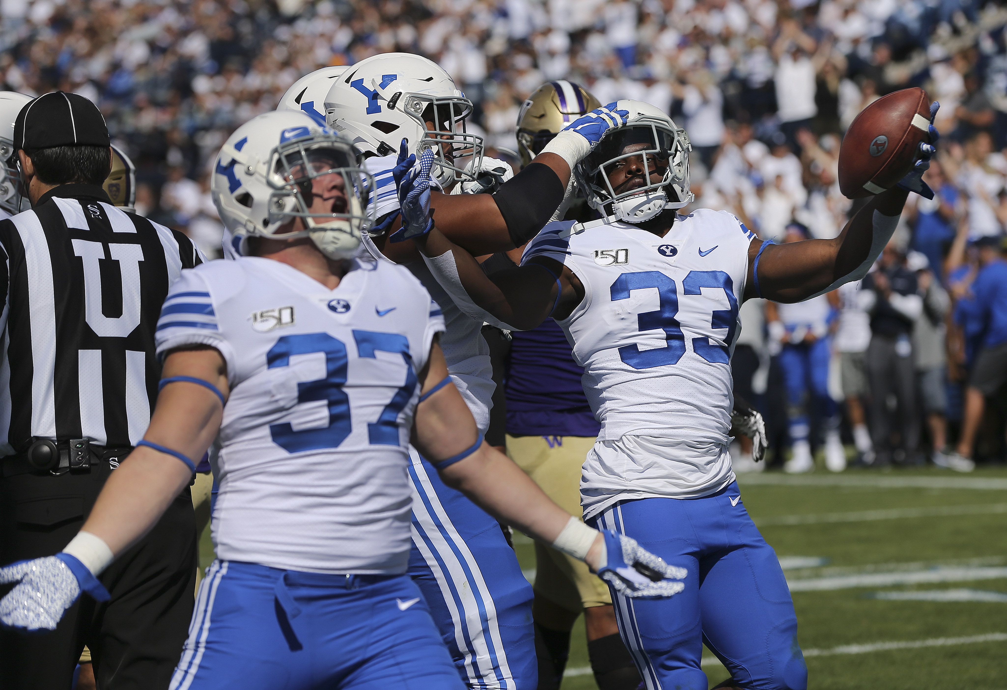 Brigham Young Cougars running back Emmanuel Esukpa (33) celebrates his touchdown with teammates in Provo on Saturday, Sept. 21, 2019. (Photo: Jeffrey D. Allred, KSL)