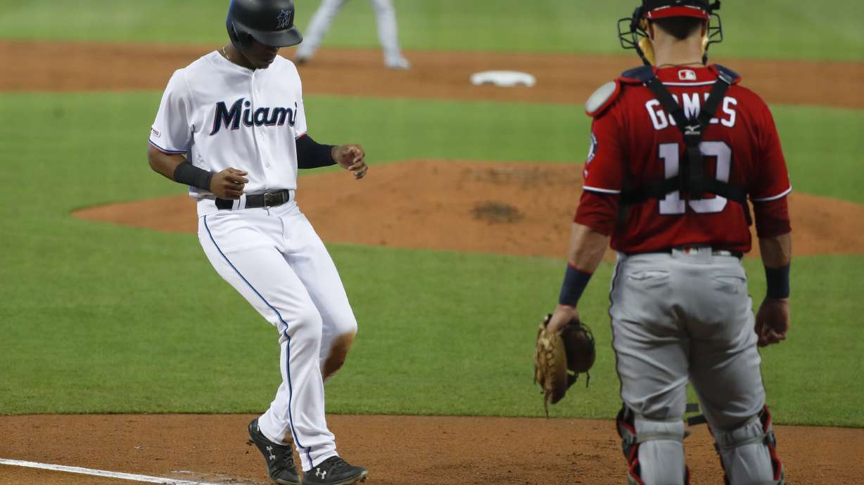Nationals lose at Marlins 5-3 to tighten NL wild-card race