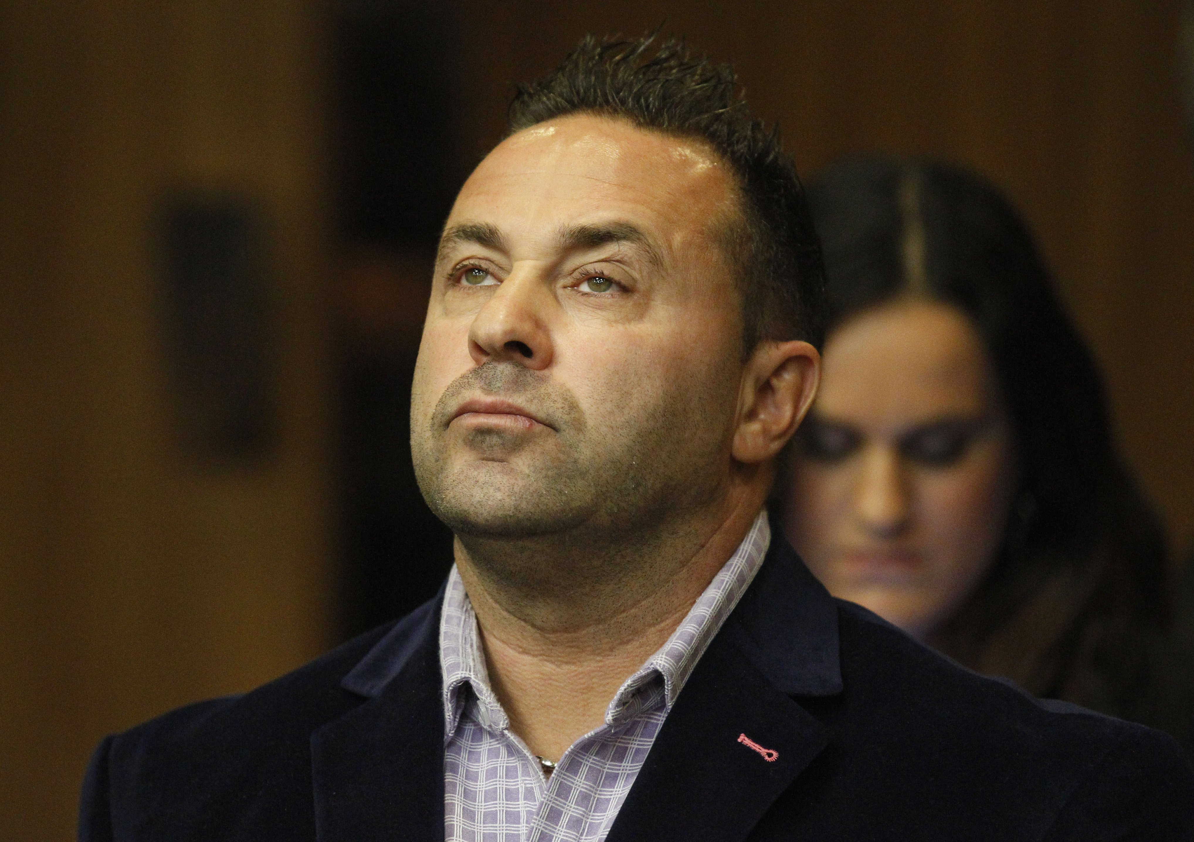 Deportation case keeps 'Real Housewives' husband jailed