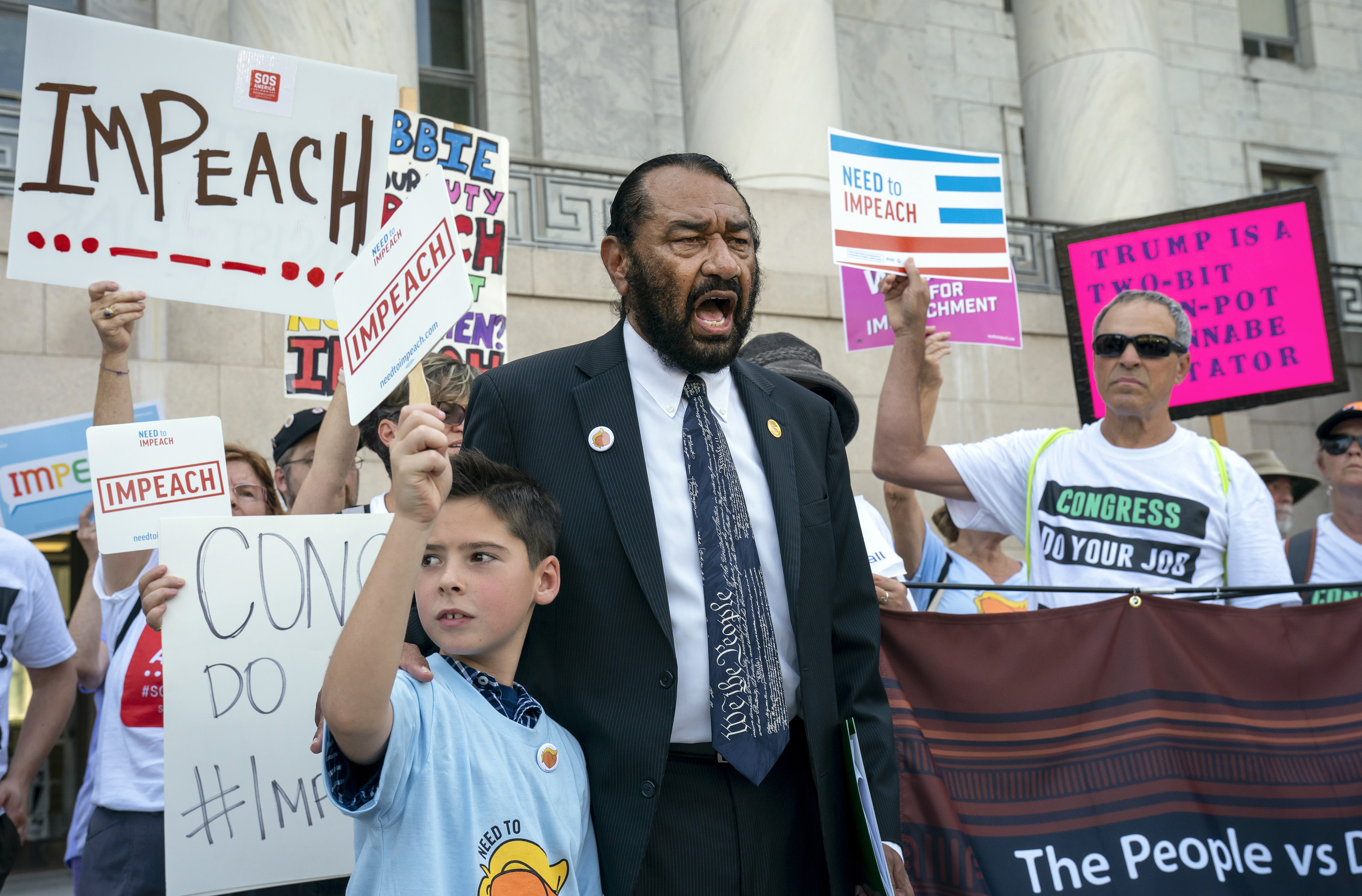 The Latest: Trump asked Ukraine leader to 'look into' Biden