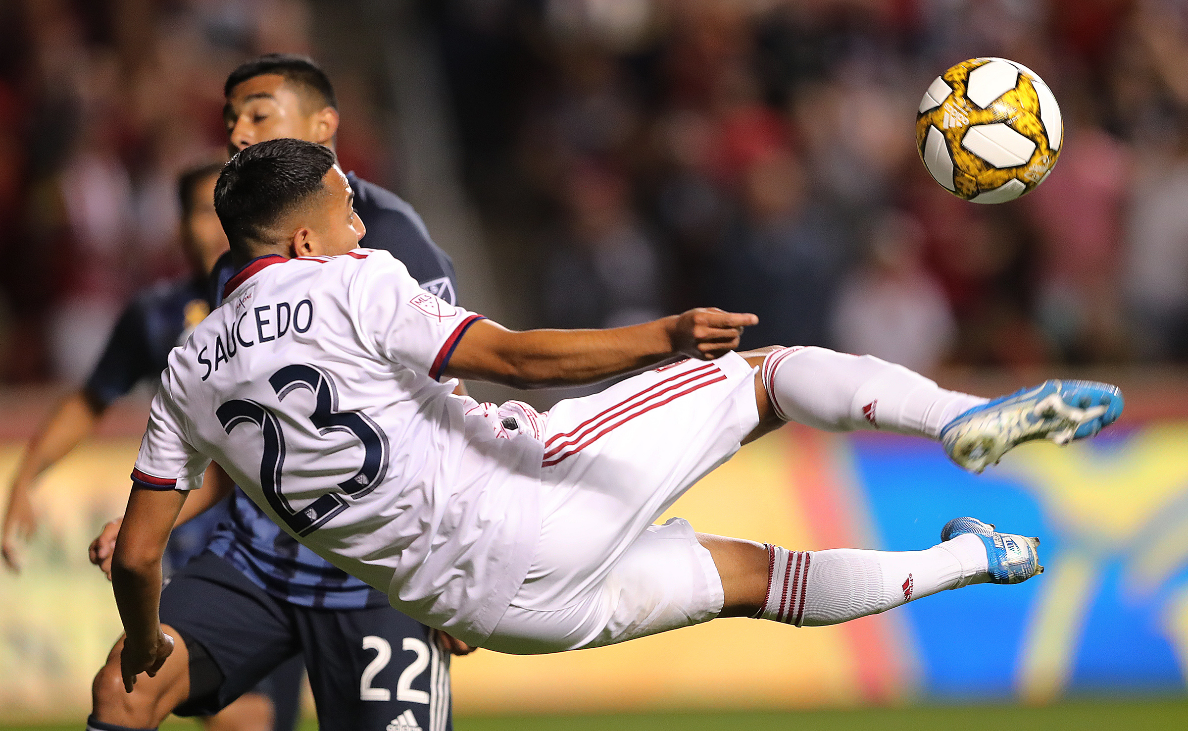 Real Salt Lake midfielder Sebastian Saucedo (23) tries to kick a bicycle kick as Real Salt Lake and the LA Galaxy play at Rio Tinto Stadium in Sandy on Wednesday, Sept. 25, 2019. LA won 2-1. (Photo: Scott G Winterton, KSL)