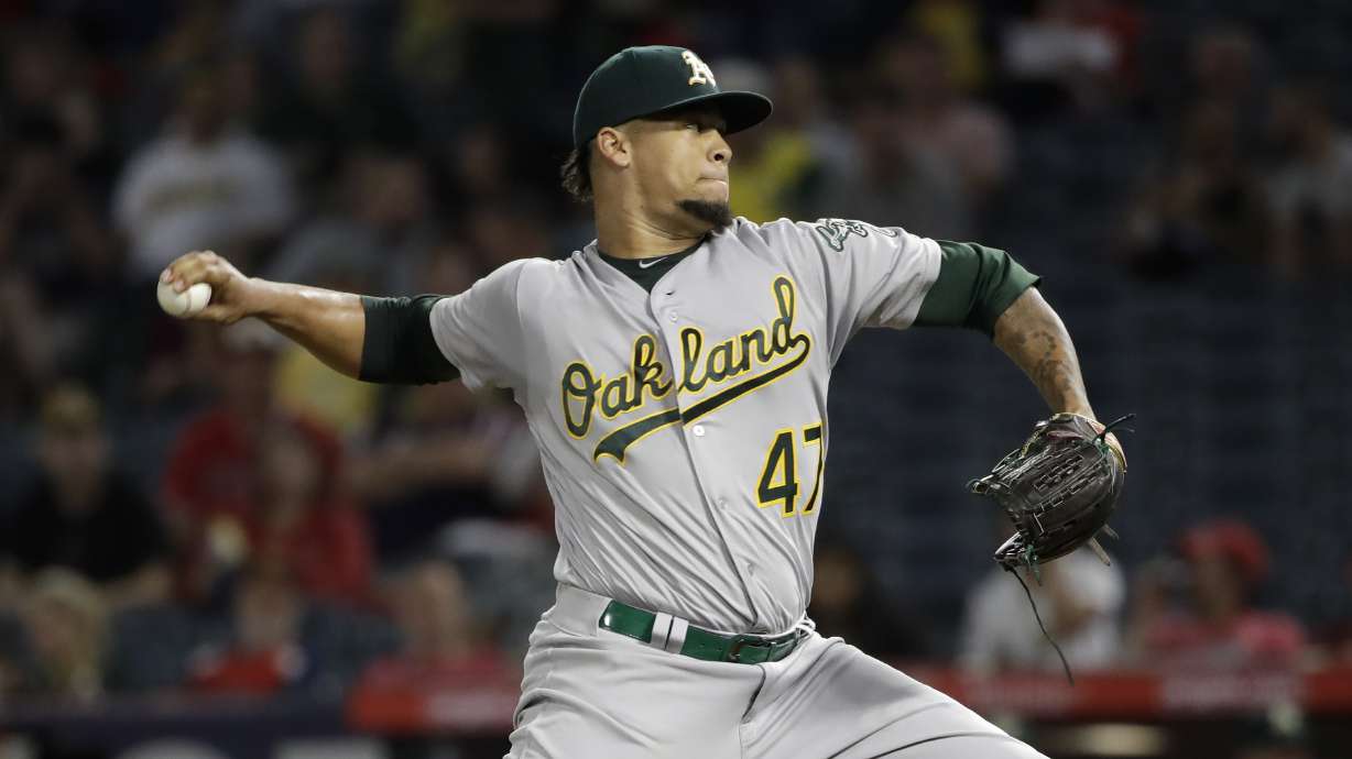 Chapman HR in 9th, A's help wild-card hopes, top Angels 3-2