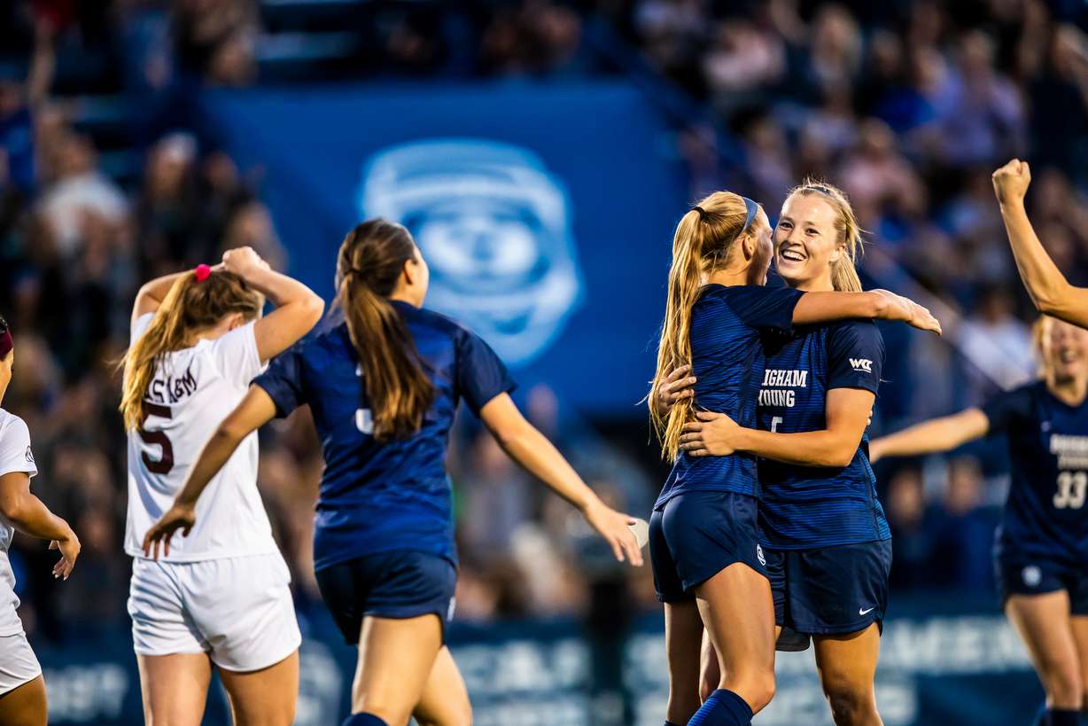 Elise Flake is congratulated by her teammates after scoring one of two goals during a 2-0 win over Texas A&M at South Field, Thursday, Sept. 12, 2019 in Provo. (Courtesy: BYU Photo)
