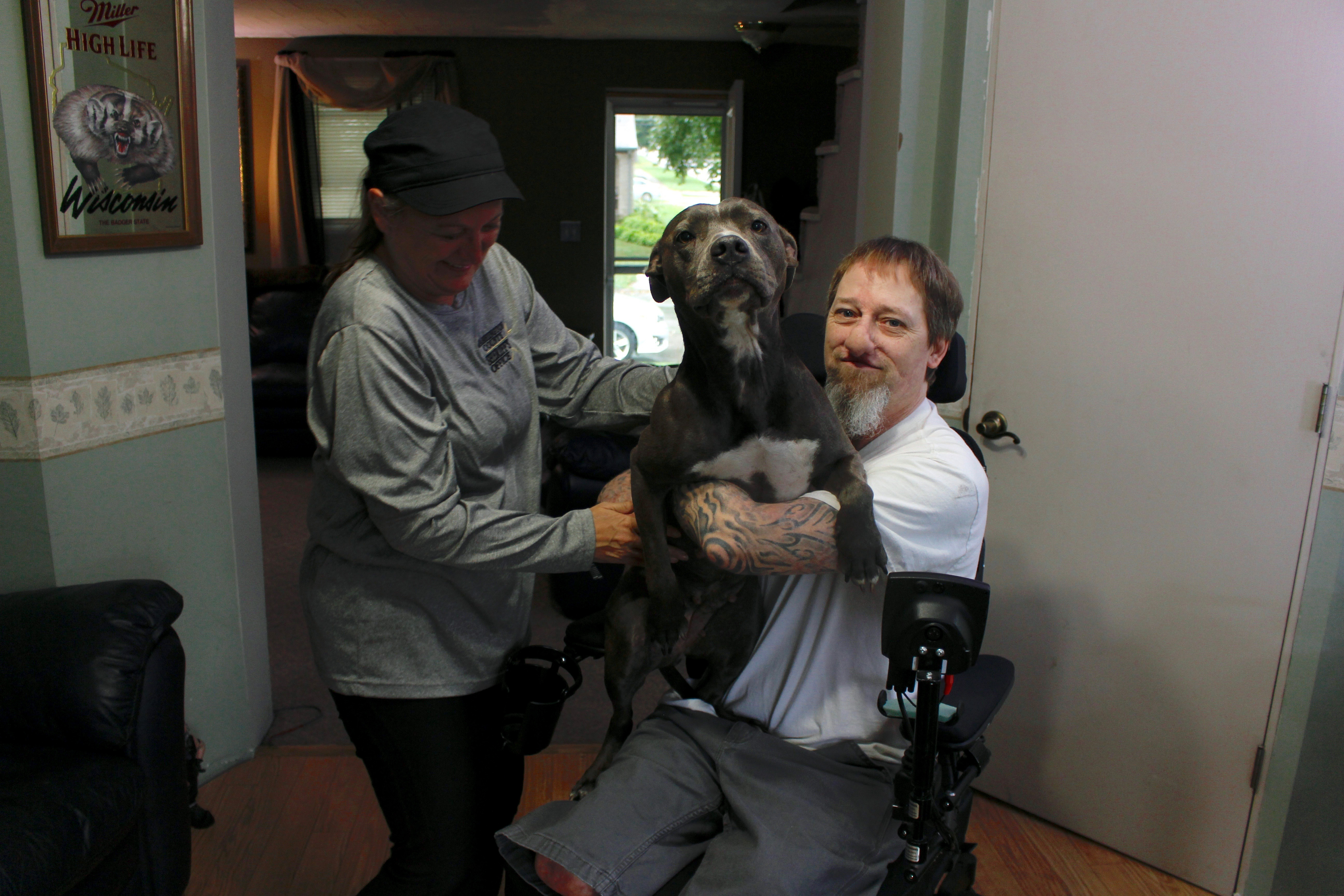 Standing by Ellie: Man's loyalty to dog defies rare illness