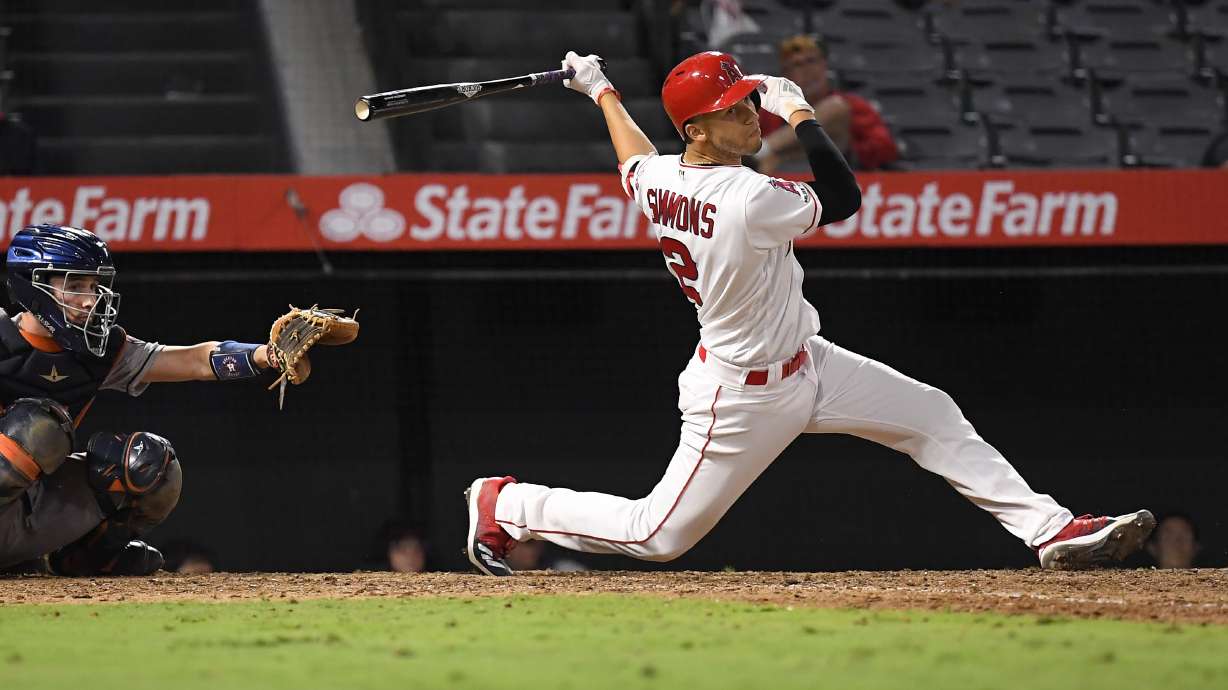 MLB attendance drops in boom-bust era of big winners, losers
