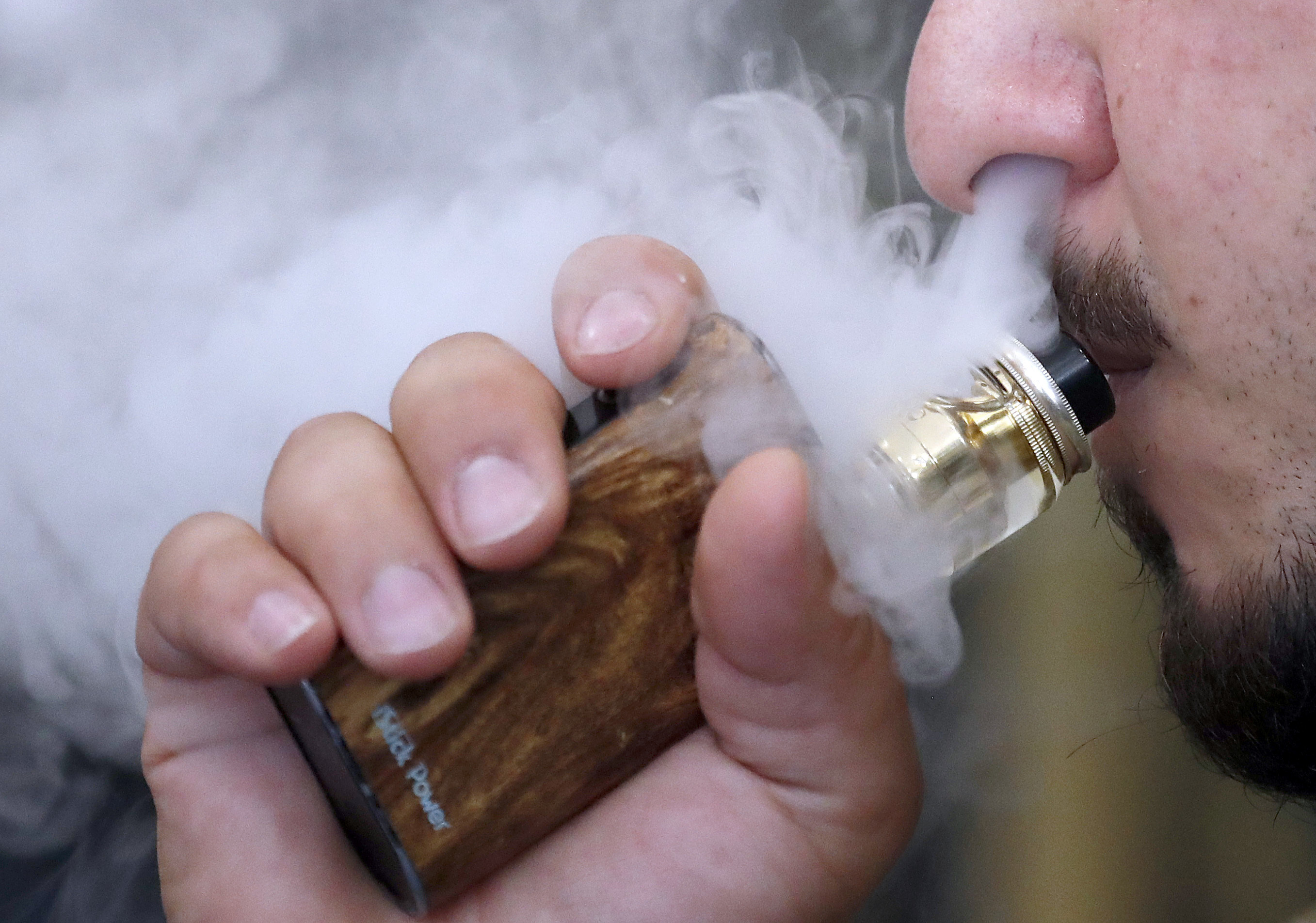 Keep calm and vape on: UK embraces e-cigarettes, US cautious