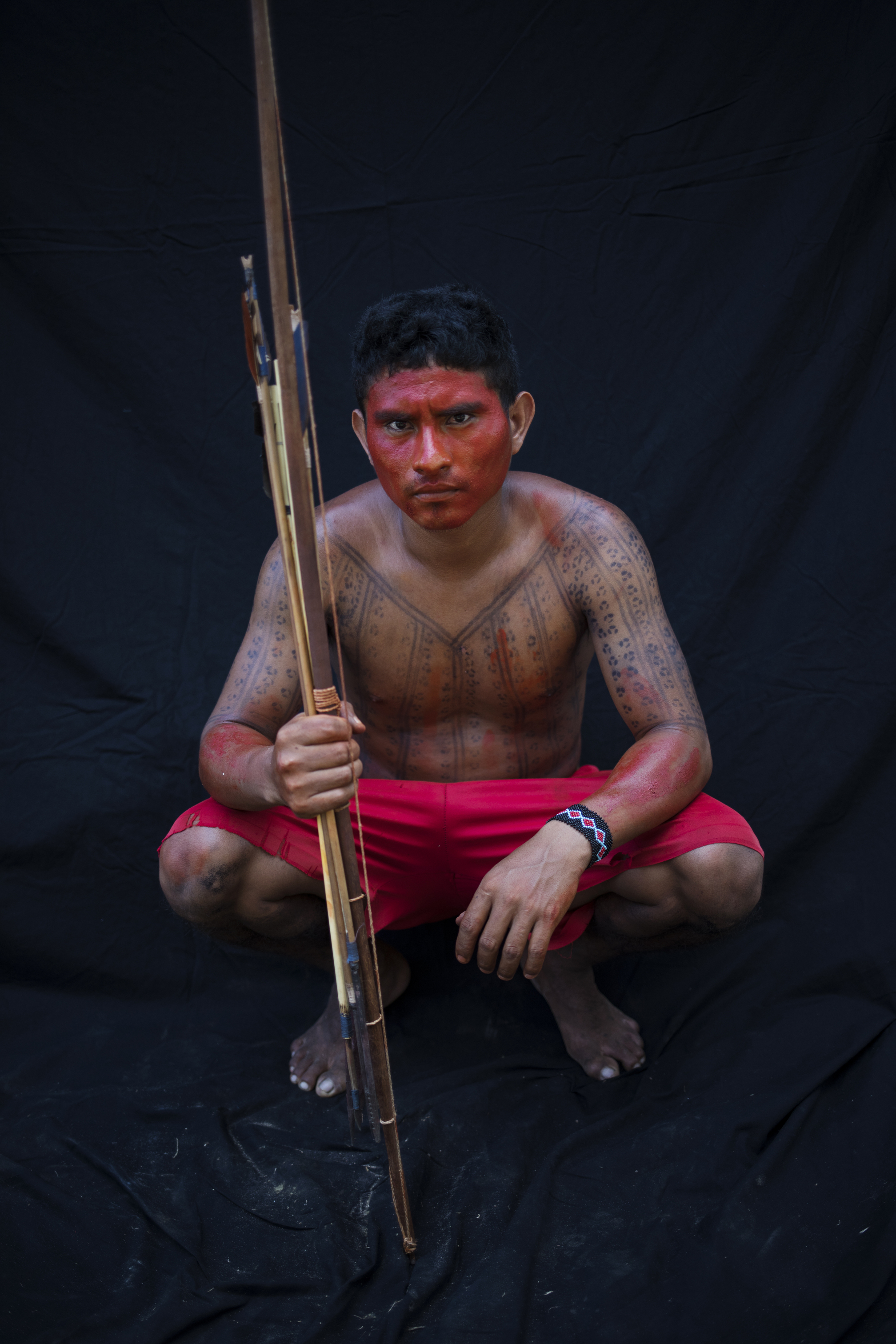 AP PHOTOS: Amazon's Tembe paint bodies for rituals and war