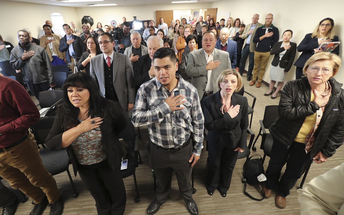 Attendees recite the Pledge of Allegiance during the grand opening of the Salt Lake City-area census office in South Salt Lake on Tuesday, Oct. 1, 2019. (Photo: Jeffrey D. Allred, KSL)