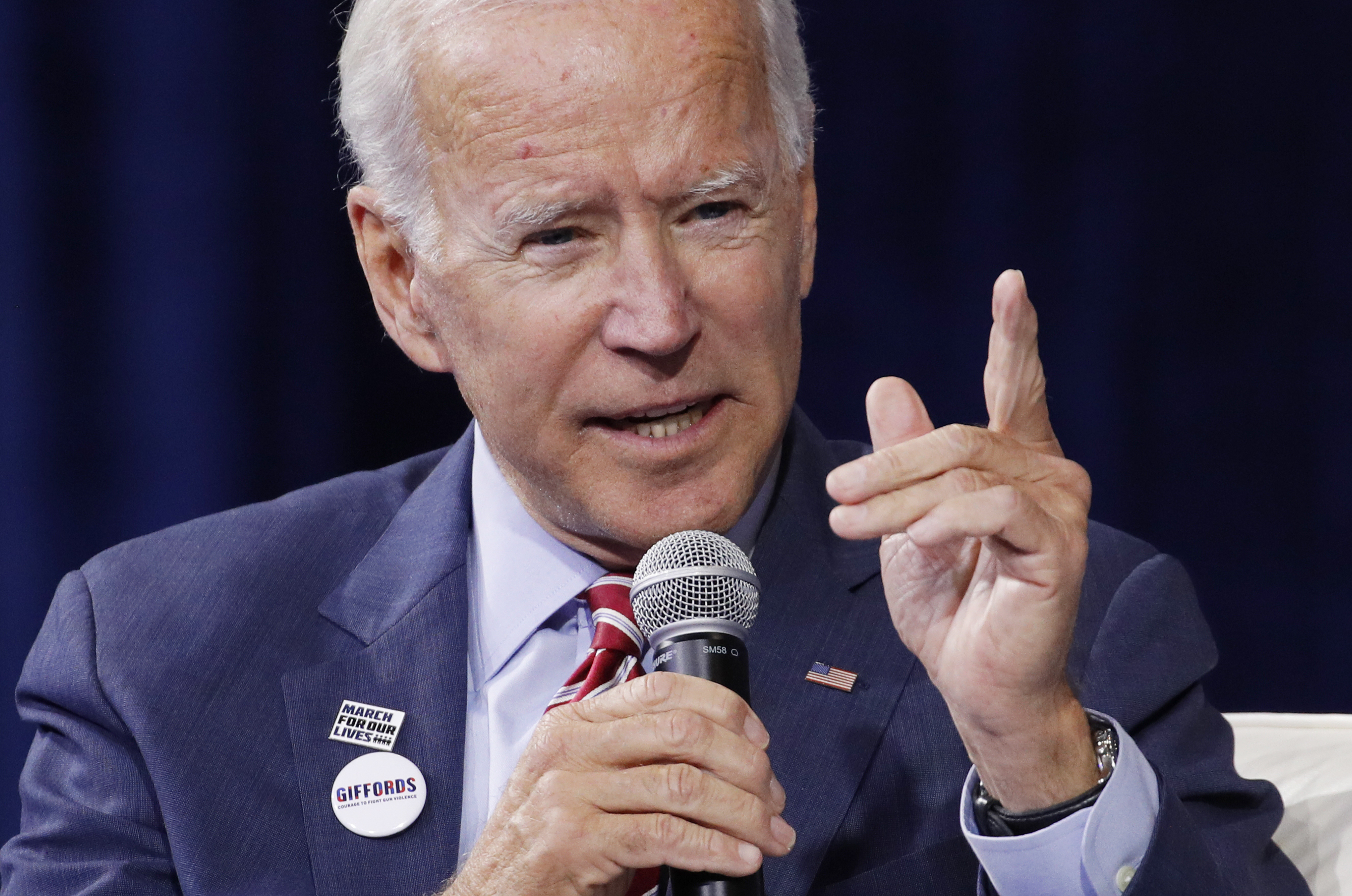 Punching back at Trump, Biden defends his Ukraine role