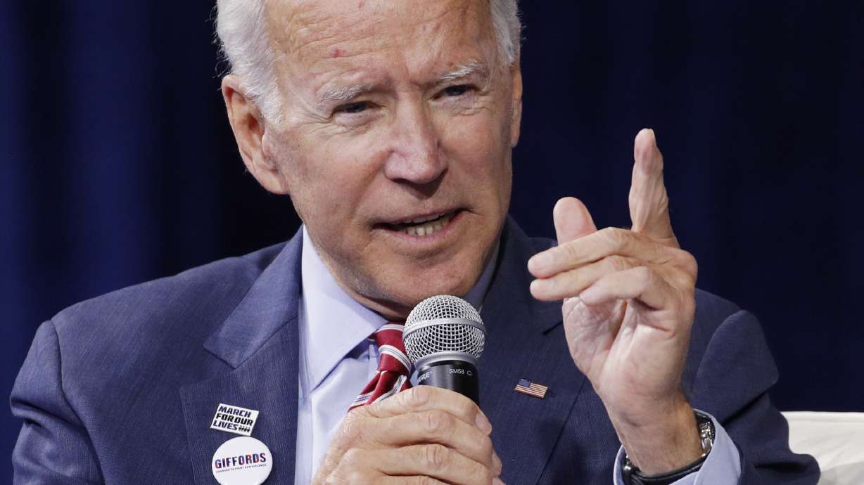 Punching back at Trump, Biden defends his Ukraine role