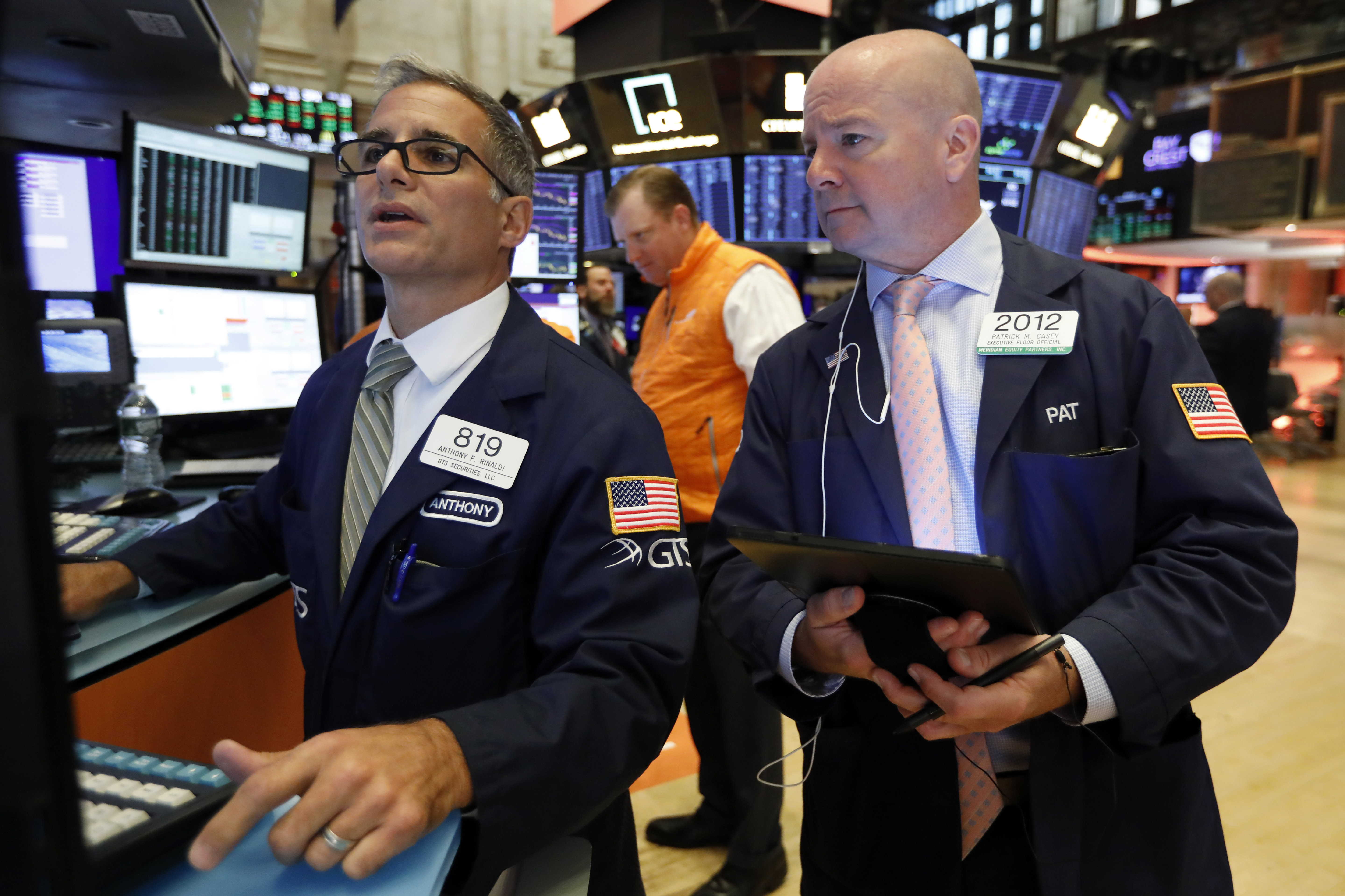Stocks climb as job report gives some solace after wild week