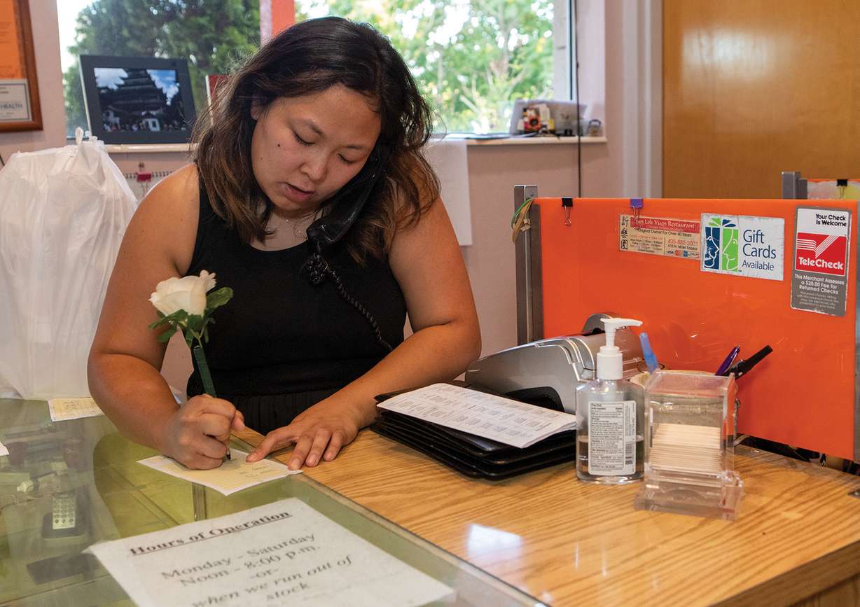 A waitress writes down a customer's order at the Sun Lok Yuen restaurant in Tooele. (Photo: Francie Aufdemorte, Tooele Transcript Bulletin)