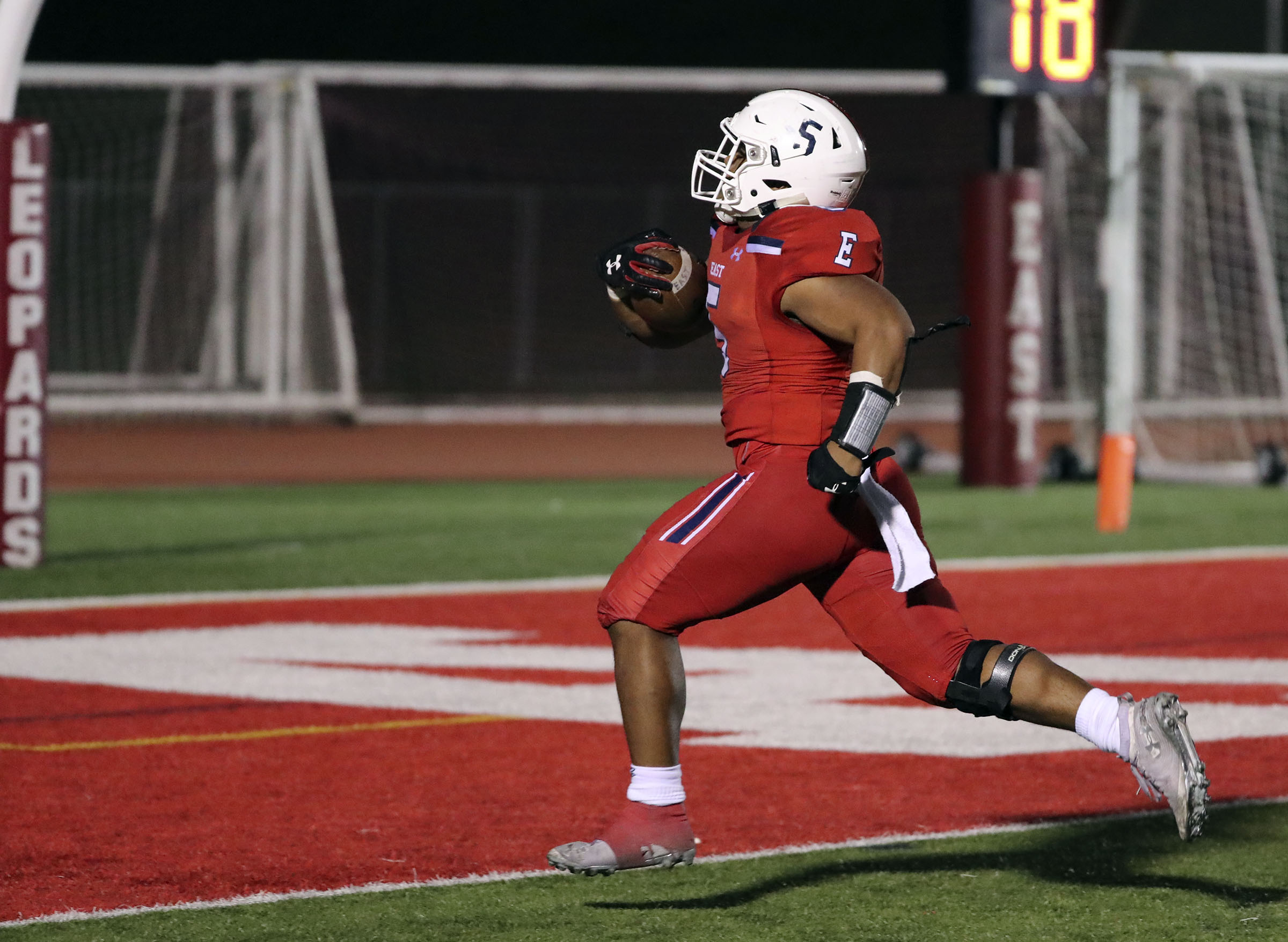 East High's Sione Angilau scores a touchdown during a football game against Herriman at East High School in Salt Lake City on Friday, Oct. 4, 2019. East won 13-10. (Photo: Kristin Murphy, KSL)