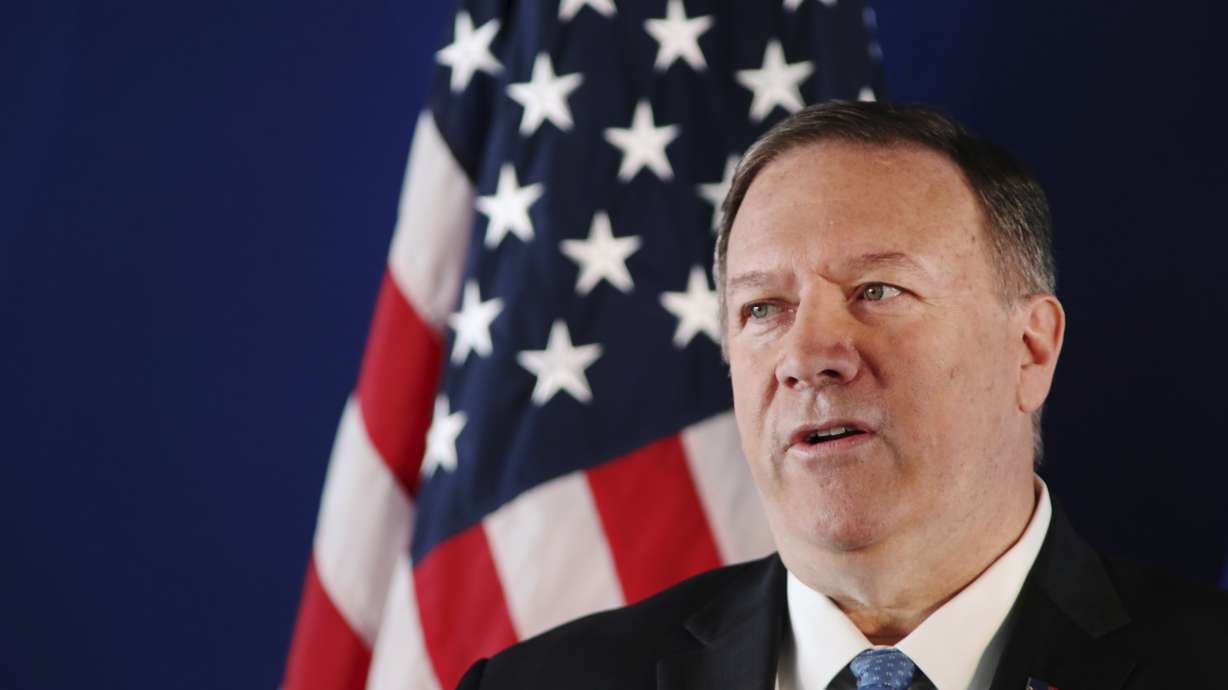 The Latest: On inquiry, Pompeo says law will be followed