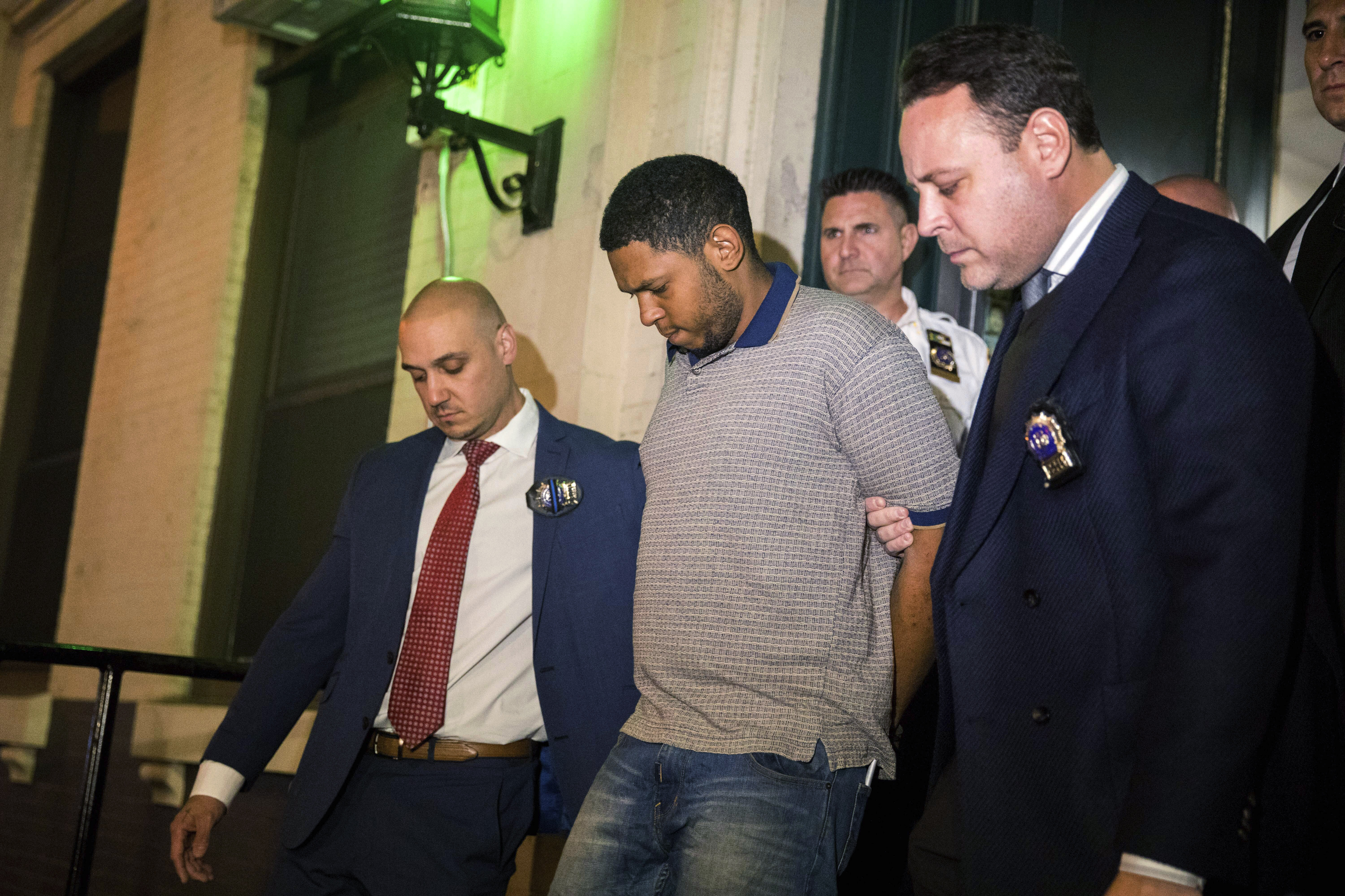 The Latest: Prosecutors: Suspect identified self in video