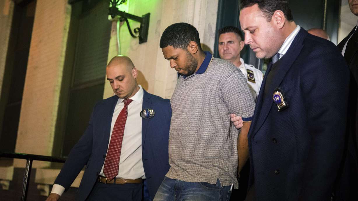 The Latest: Prosecutors: Suspect identified self in video