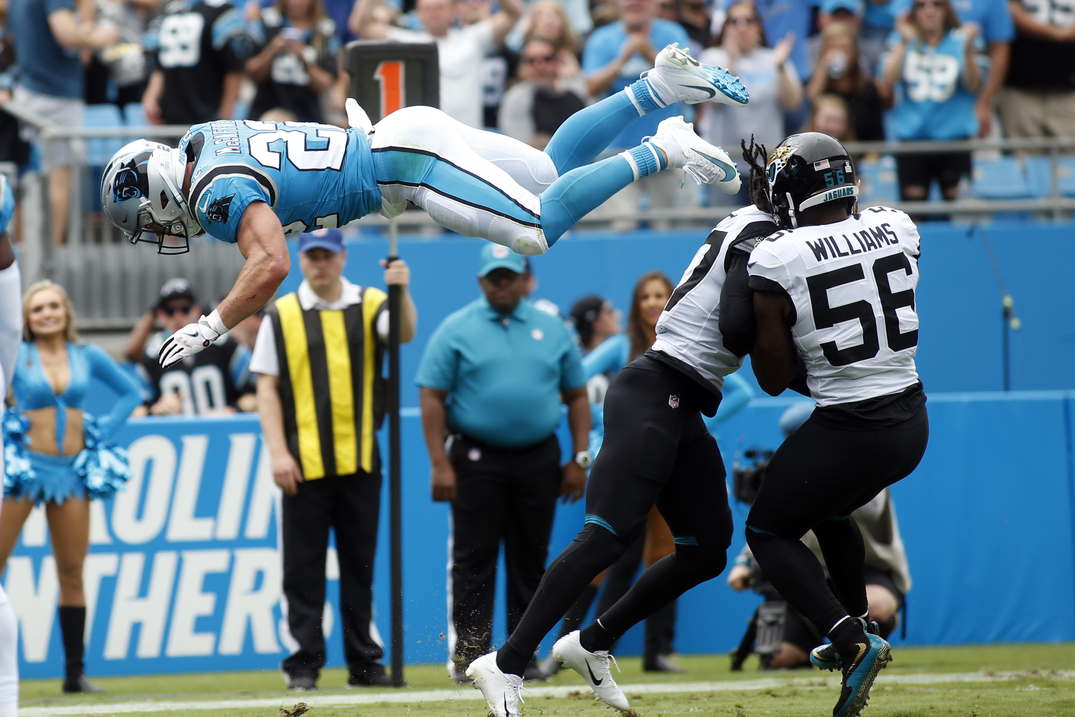 McCaffrey scores 3 TDs, Panthers hold off Jaguars 34-27