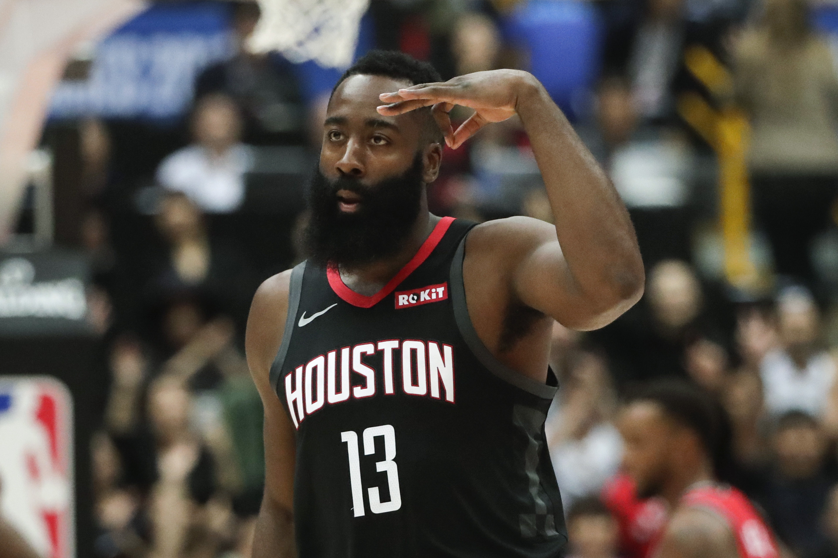 Harden dazzles, then Raptors rally past Rockets in Japan