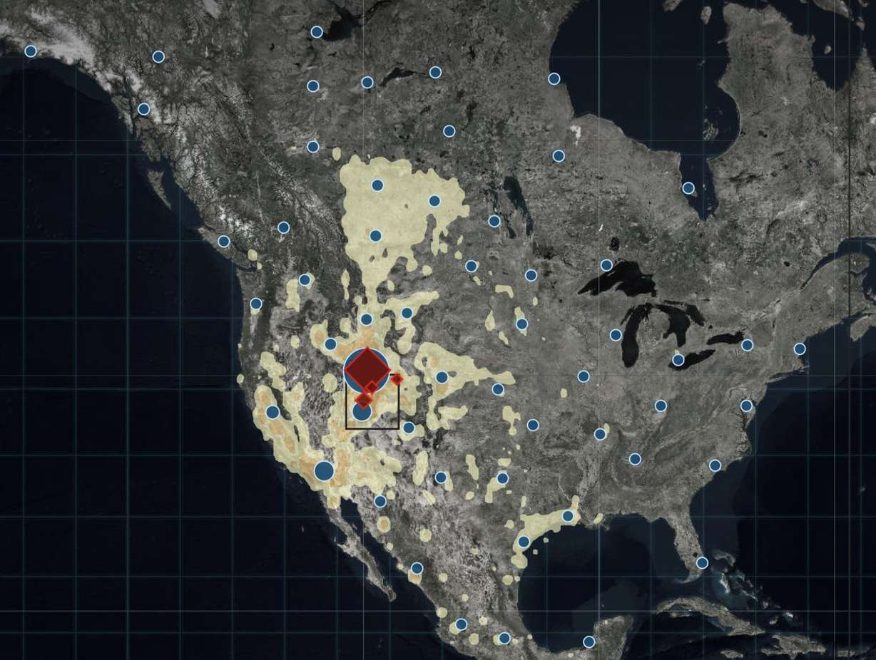 A map of North America in relation to all waterfowl migration. The red diamonds represent where the birds were banded. The shades of yellow and orange indicate waterfowl return density. The blue dots represent pockets of where waterfowl were later found. (Photo: Utah Division of Wildlife Resources)