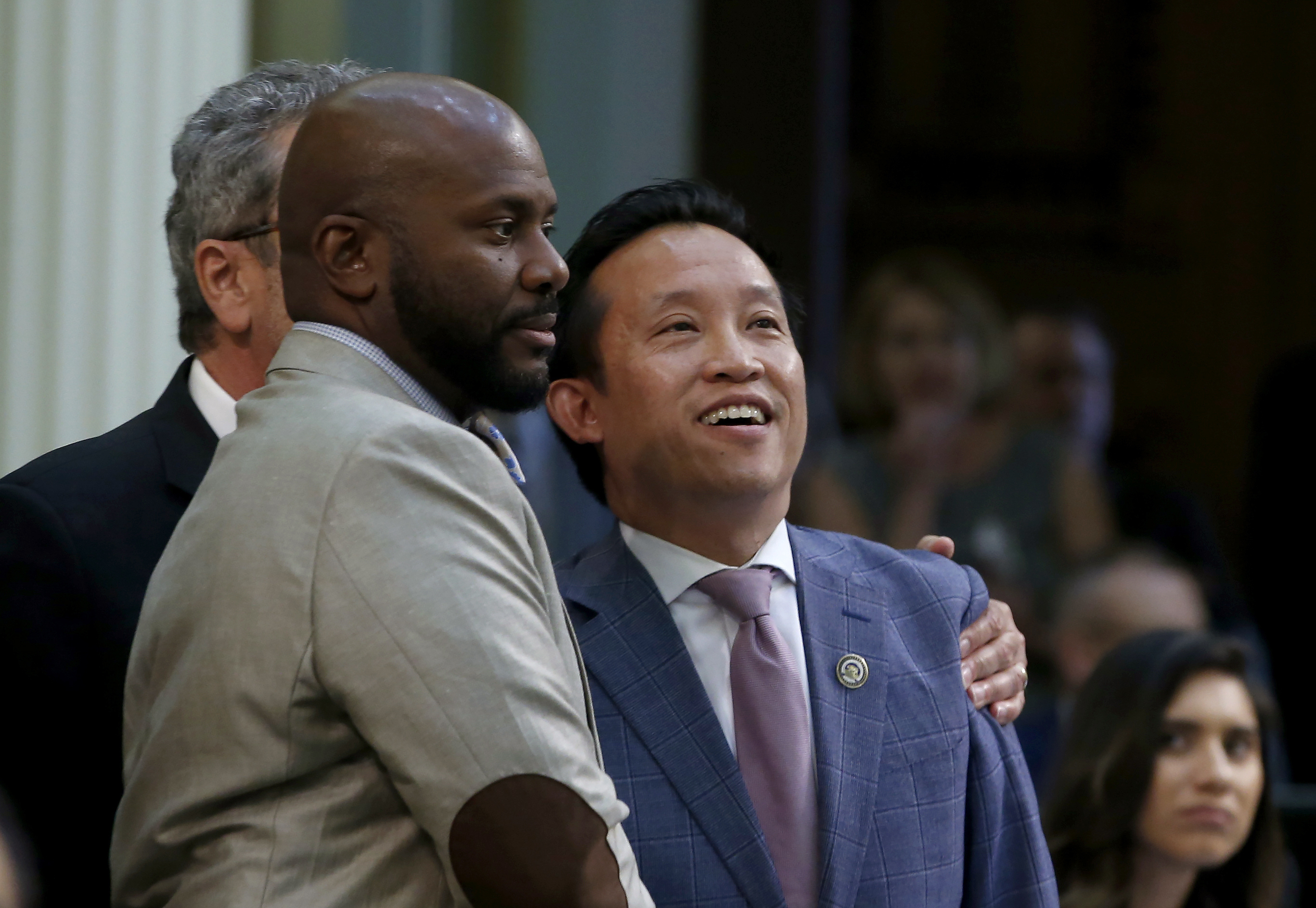 The Latest: California governor signs law capping rent hikes