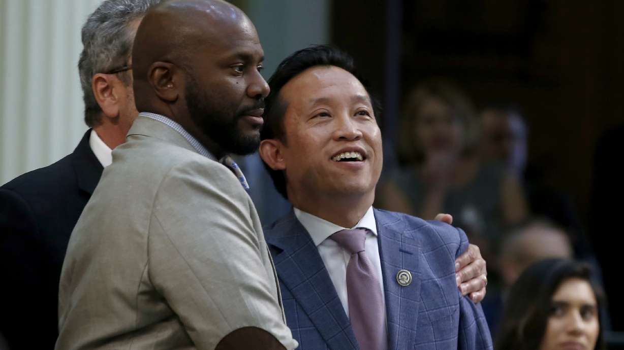The Latest: California governor signs law capping rent hikes