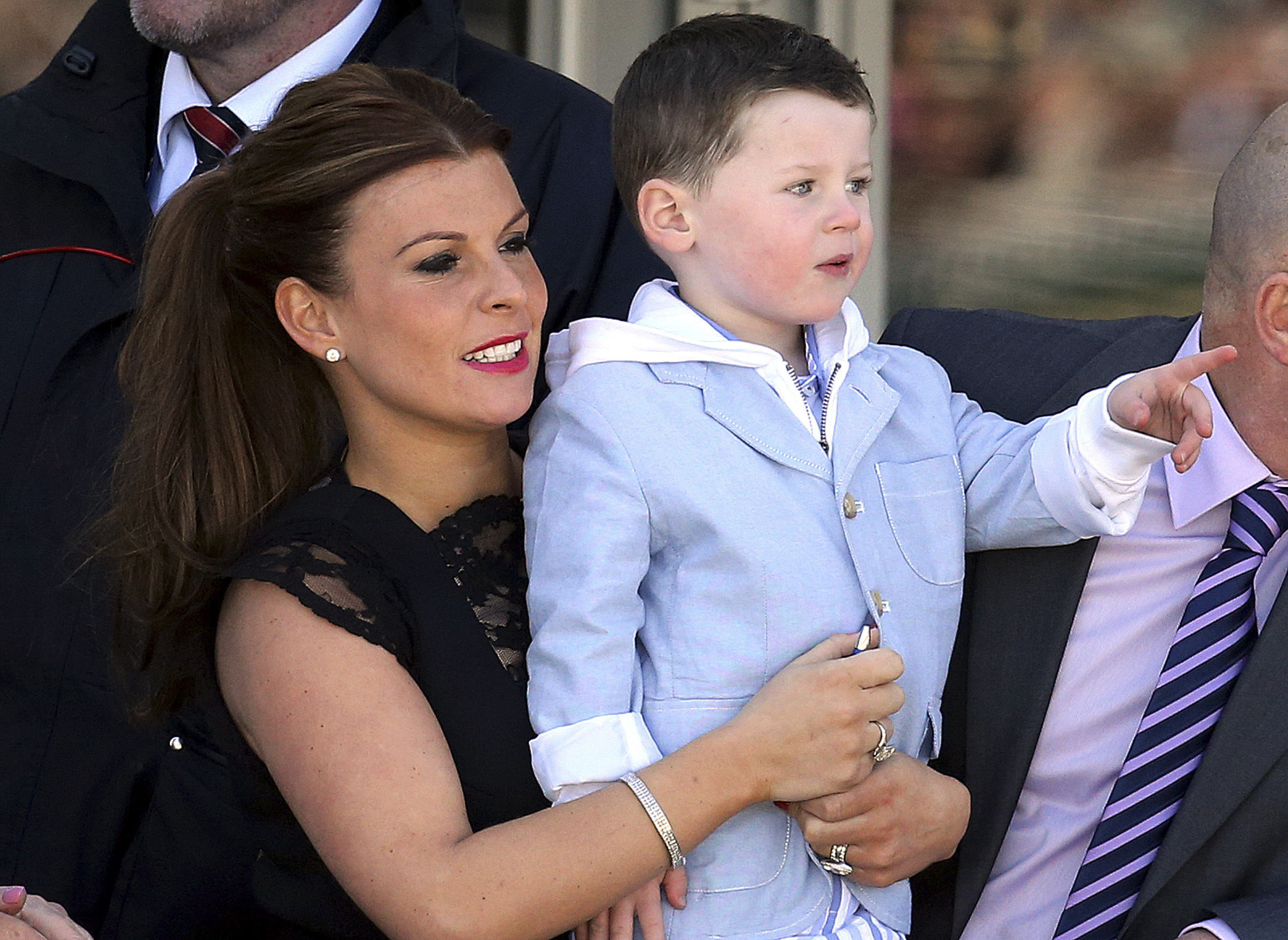 High-profile soccer wives in Twitter spat over story leaks