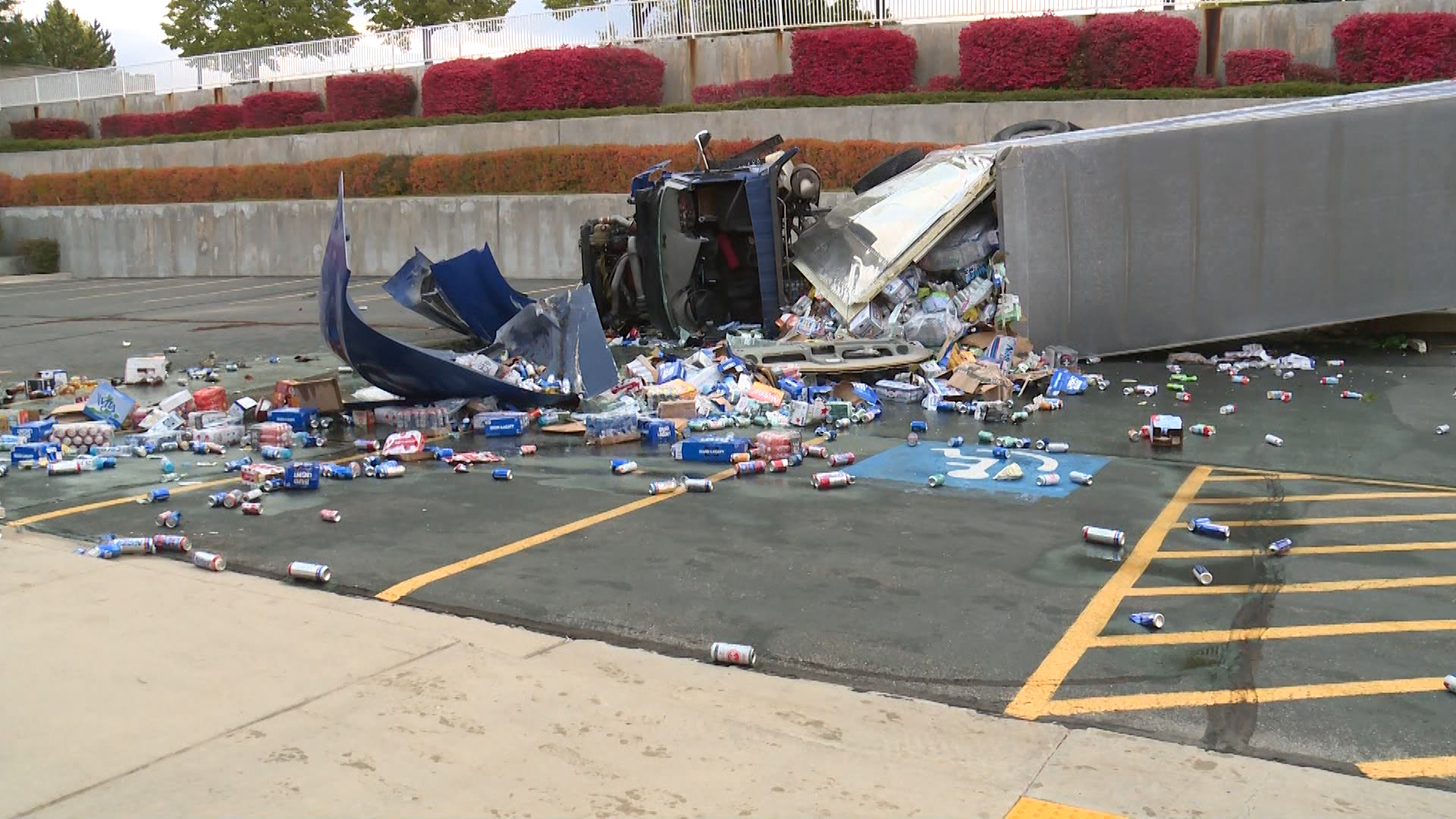 Semitruck driver suffers serious injuries after beer truck crashes in Sandy church parking lot