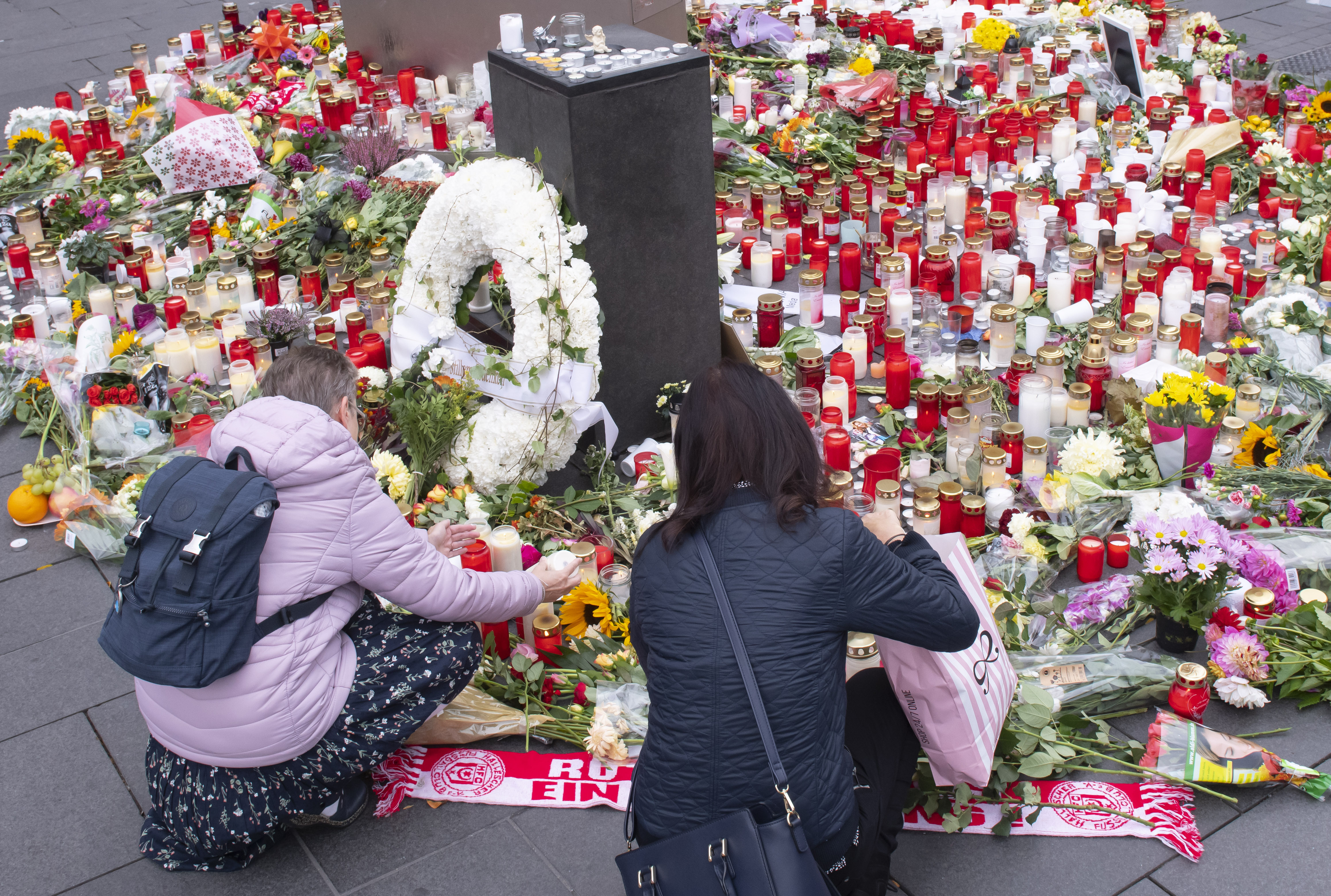 Suspect in German attack admits to shooting, ordered held