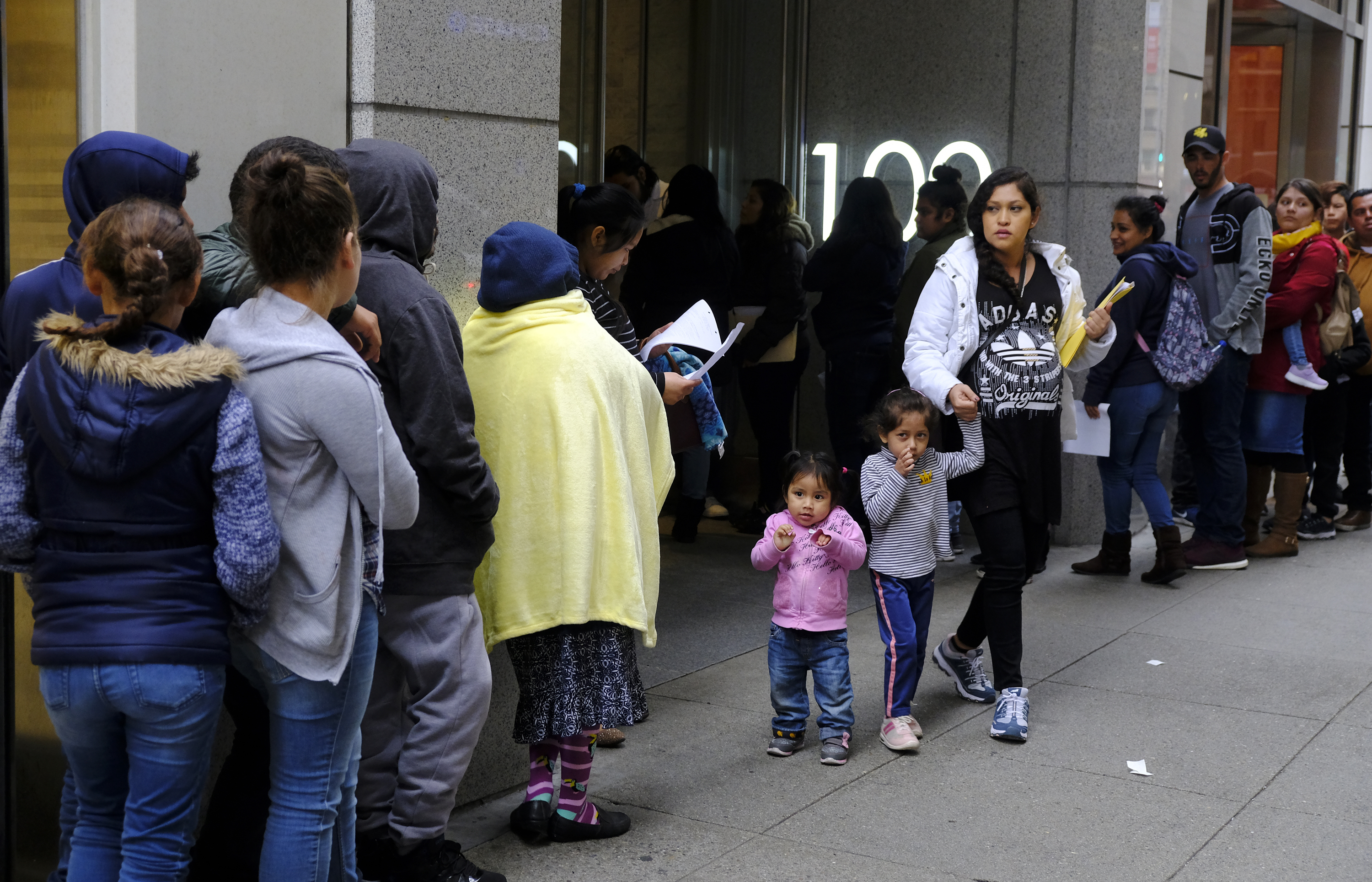 The Latest: Third judge blocks policy for green card denials