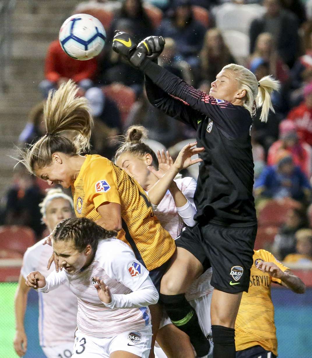 Houston Dash goalkeeper Jane Campbell (1) punches a ball out of the air in the middle of a scrum at the goal during the first half of a National Woman's Soccer League game at Rio Tinto Stadium in Sandy on Saturday, Oct. 12, 2019. (Photo: Colter Peterson, KSL)