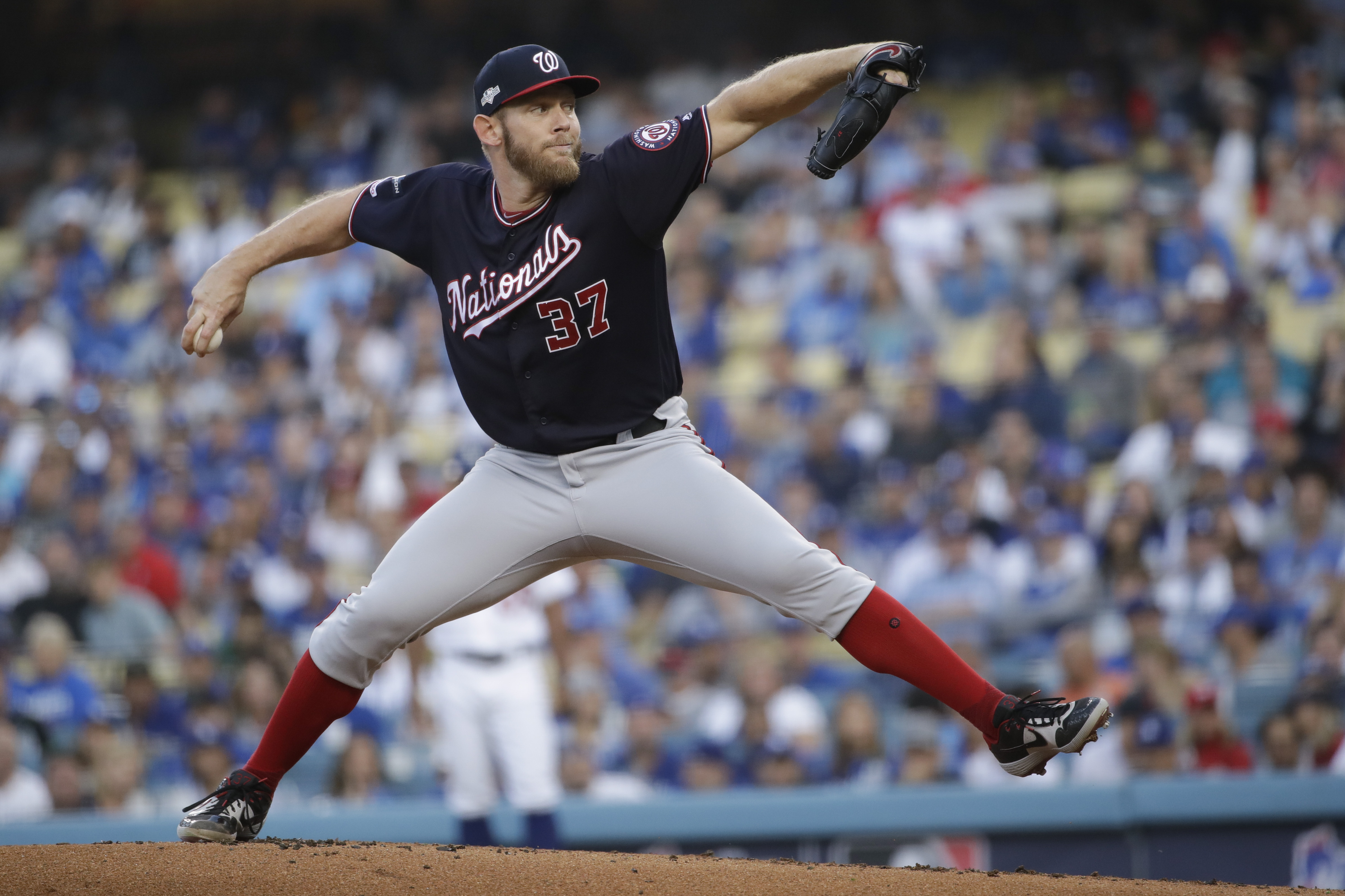 LEADING OFF: Strasburg, Nats lead Cards 2-0, Stanton hurt