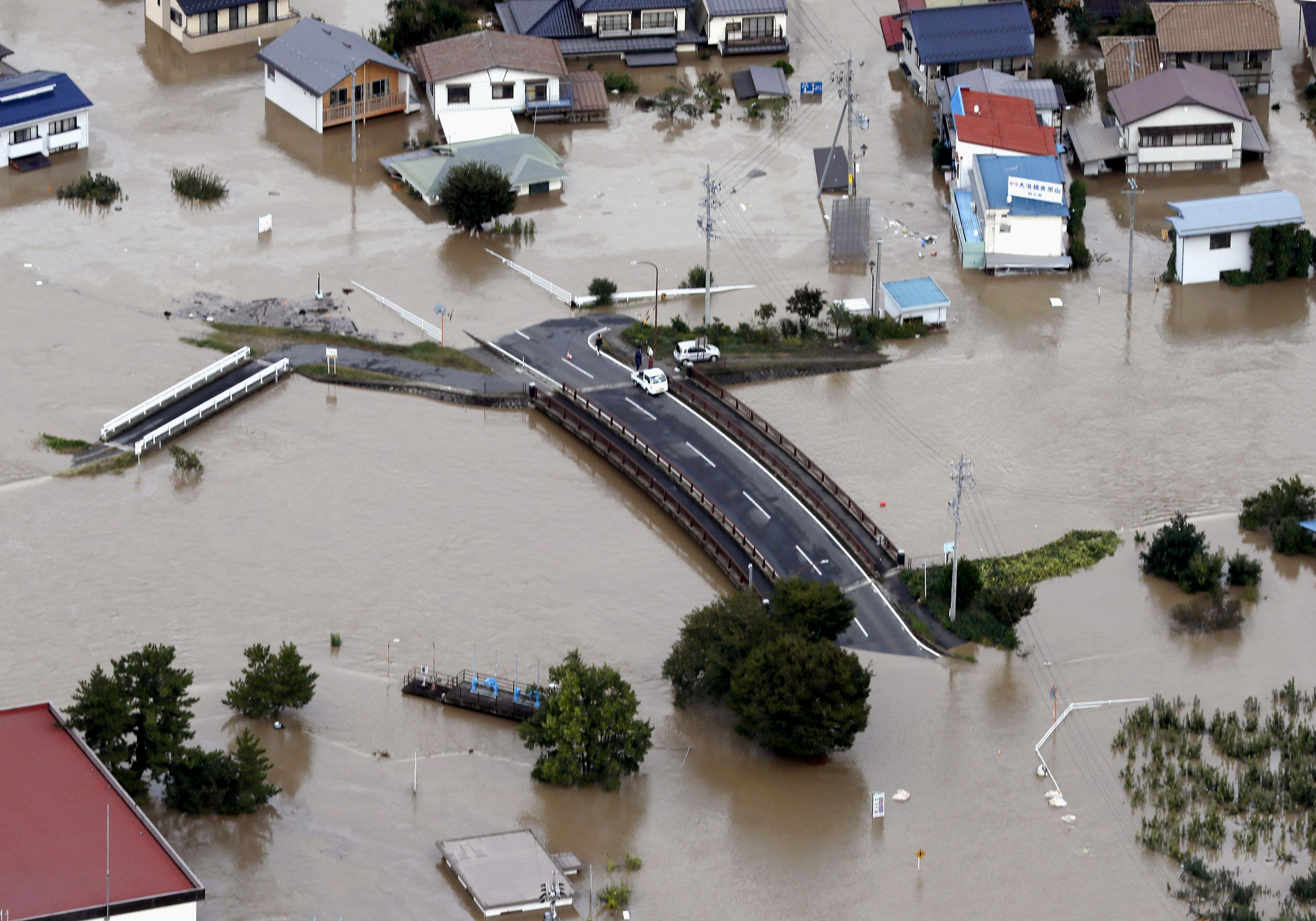 Japan looks for missing after typhoon kills dozens