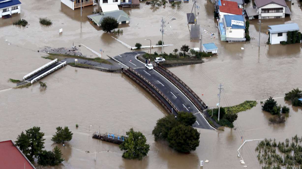 Japan looks for missing after typhoon kills dozens