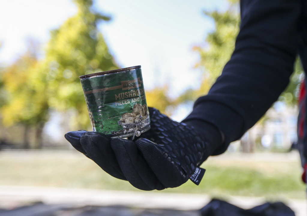 A man displays a “heat can” on the Library Square lawn in Salt Lake City on Monday, Oct. 14, 2019. Homeless people will fill a heat can with hand sanitizer and light it to keep warm on cold nights. (Photo: Colter Peterson, KSL)