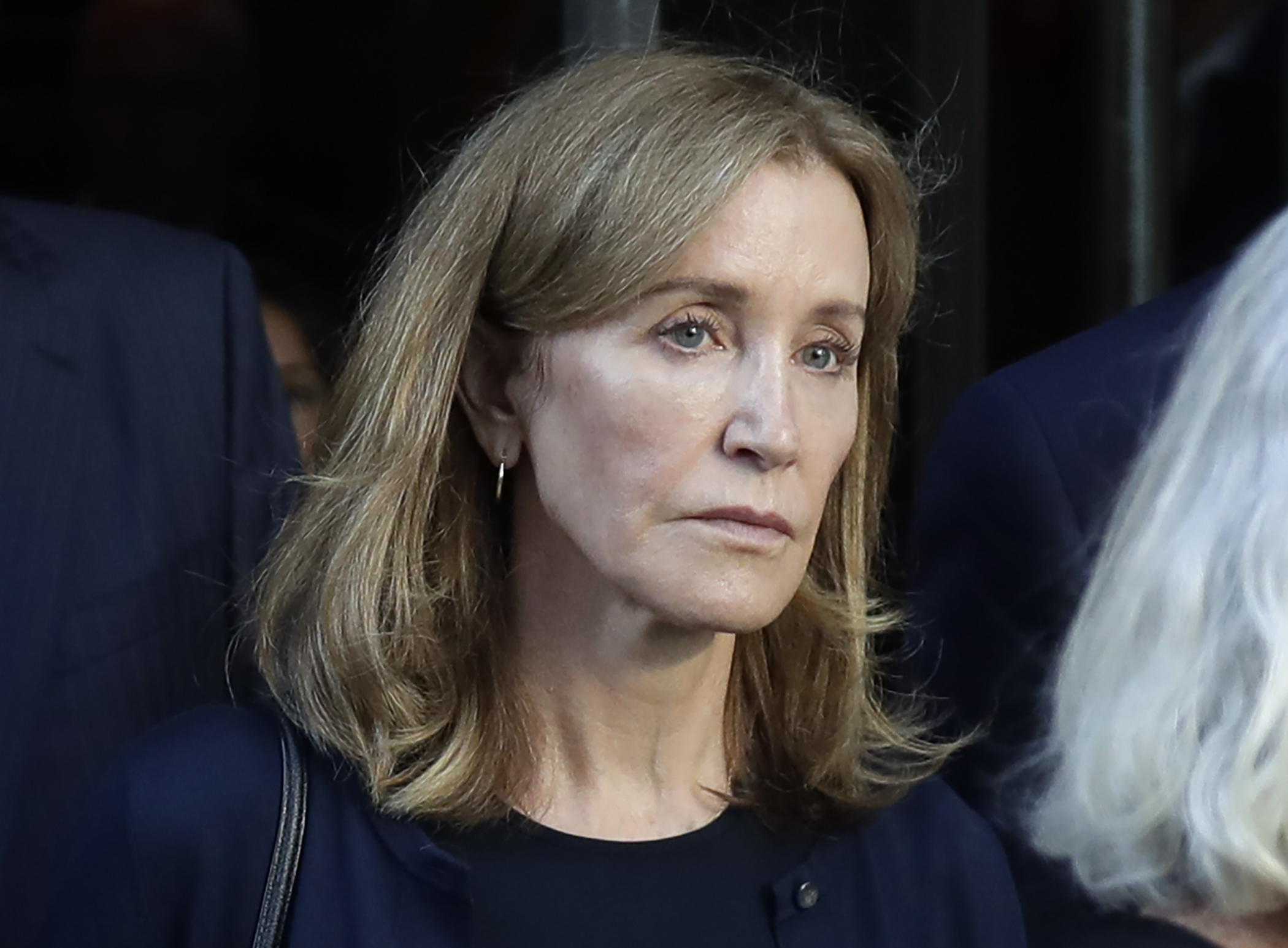 Felicity Huffman starts serving prison time in college scam