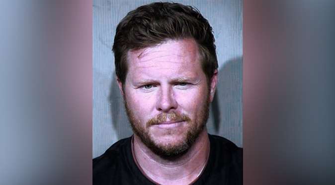 This undated booking photo provided by the Maricopa County Sheriff's Office shows County Assessor Paul Petersen, who has been indicted in an adoption fraud case. (Maricopa County Sheriff's Office via AP)