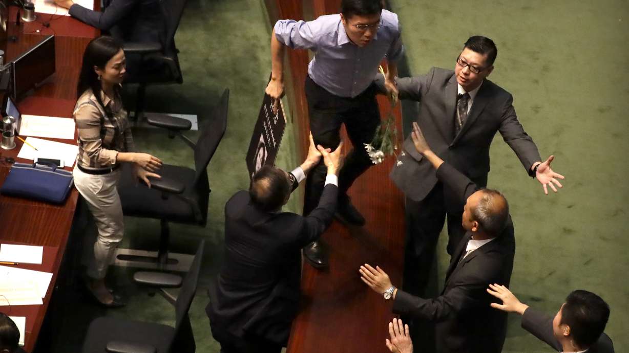 Opposition lawmakers again shout down Hong Kong leader