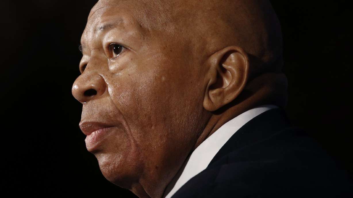 The Latest: House observes moment of silence for Cummings